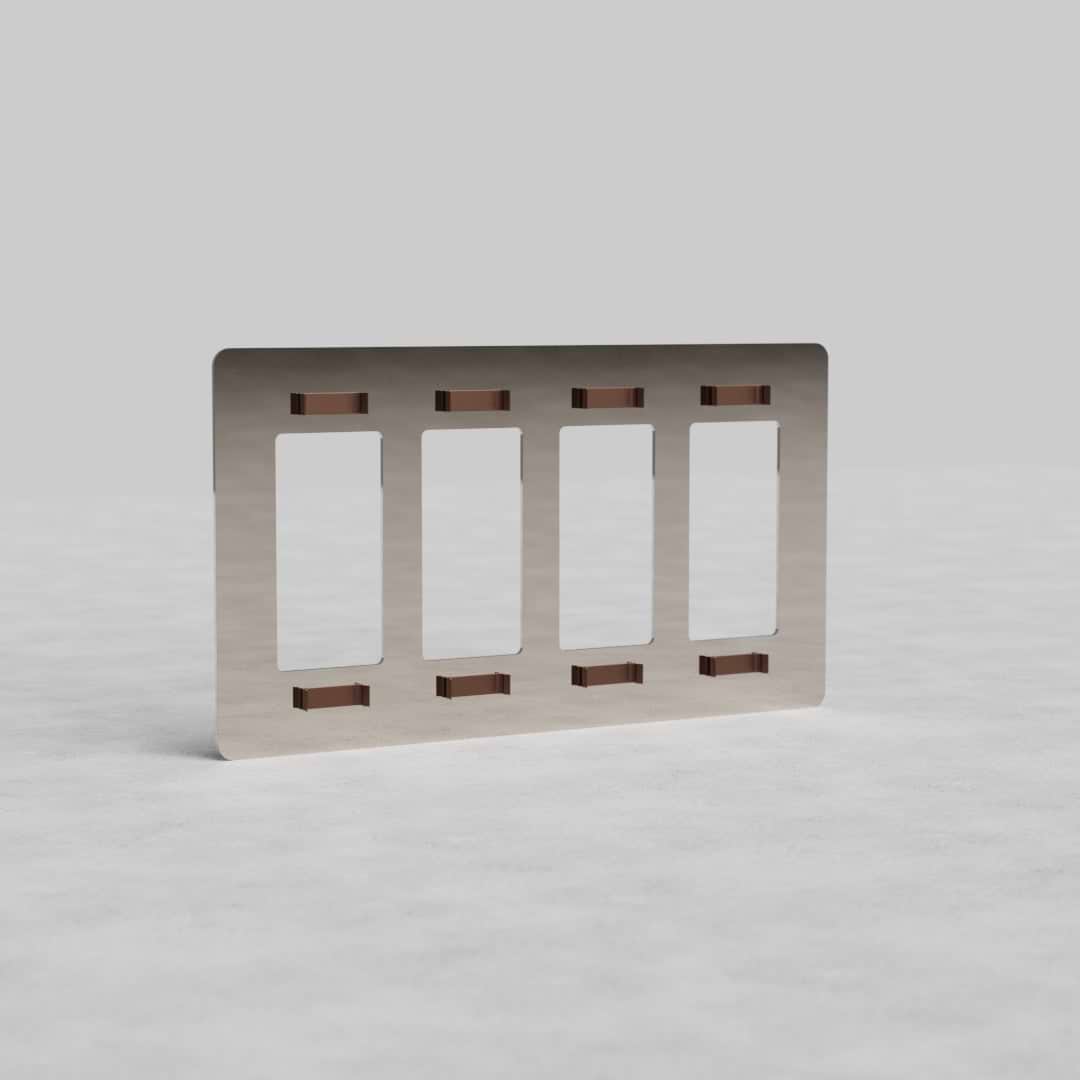4G Outlet Plate Kew US in polished nickel finish with four vertical outlets, shown on a gray surface.