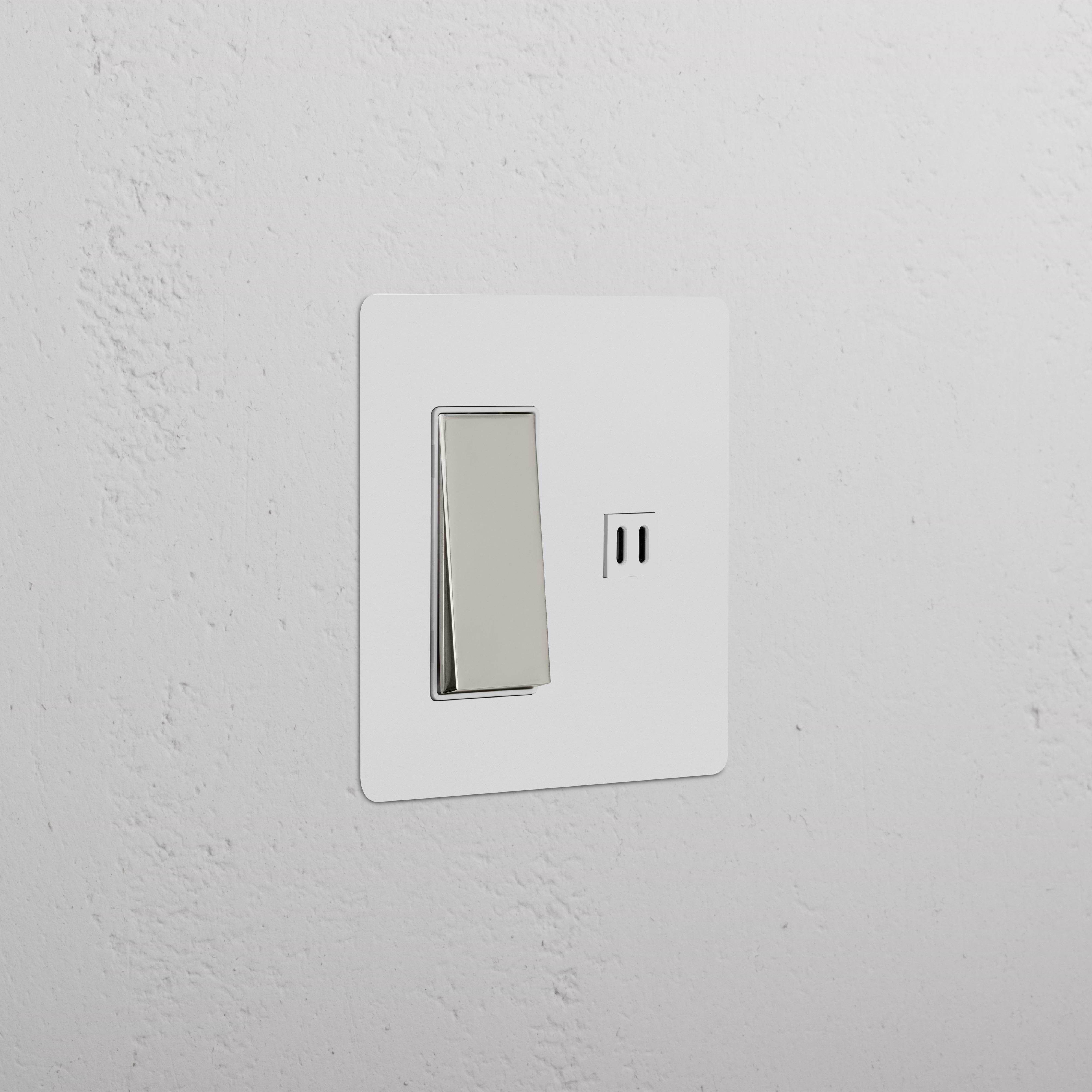 Kew 2G Rocker Switch & Fast Charge USB with paintable polished nickel white faceplate, installed on wall.