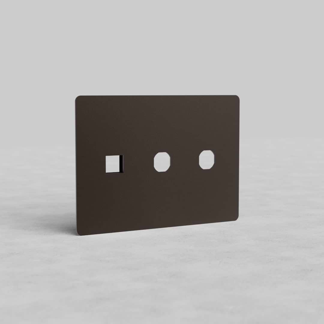 Bronze 3-gang switch and keystone plate (Kew US) with two rectangular switch cutouts and one keystone slot.