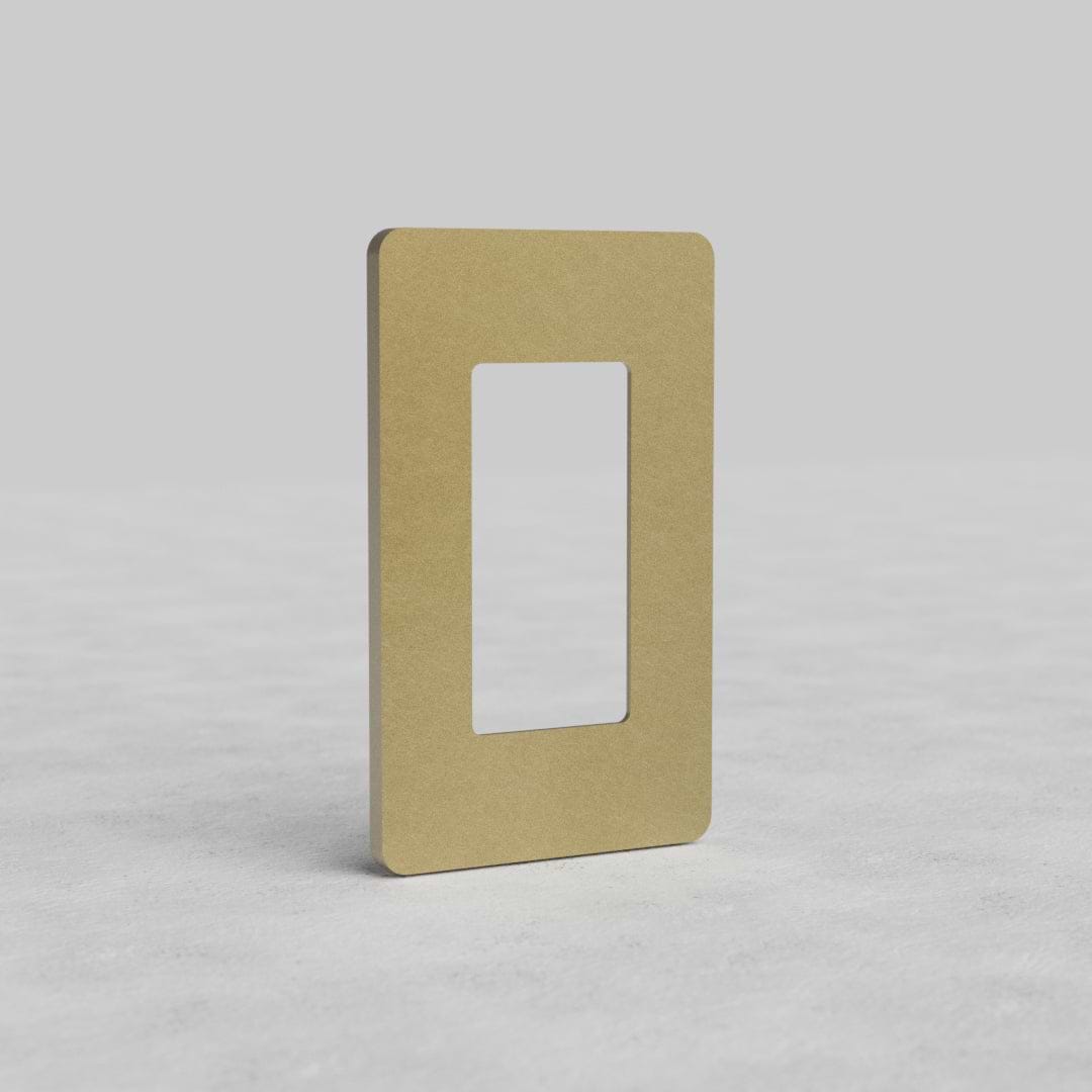 Antique brass 1-gang outlet plate, Grove US style, with central cutout, on a light background.