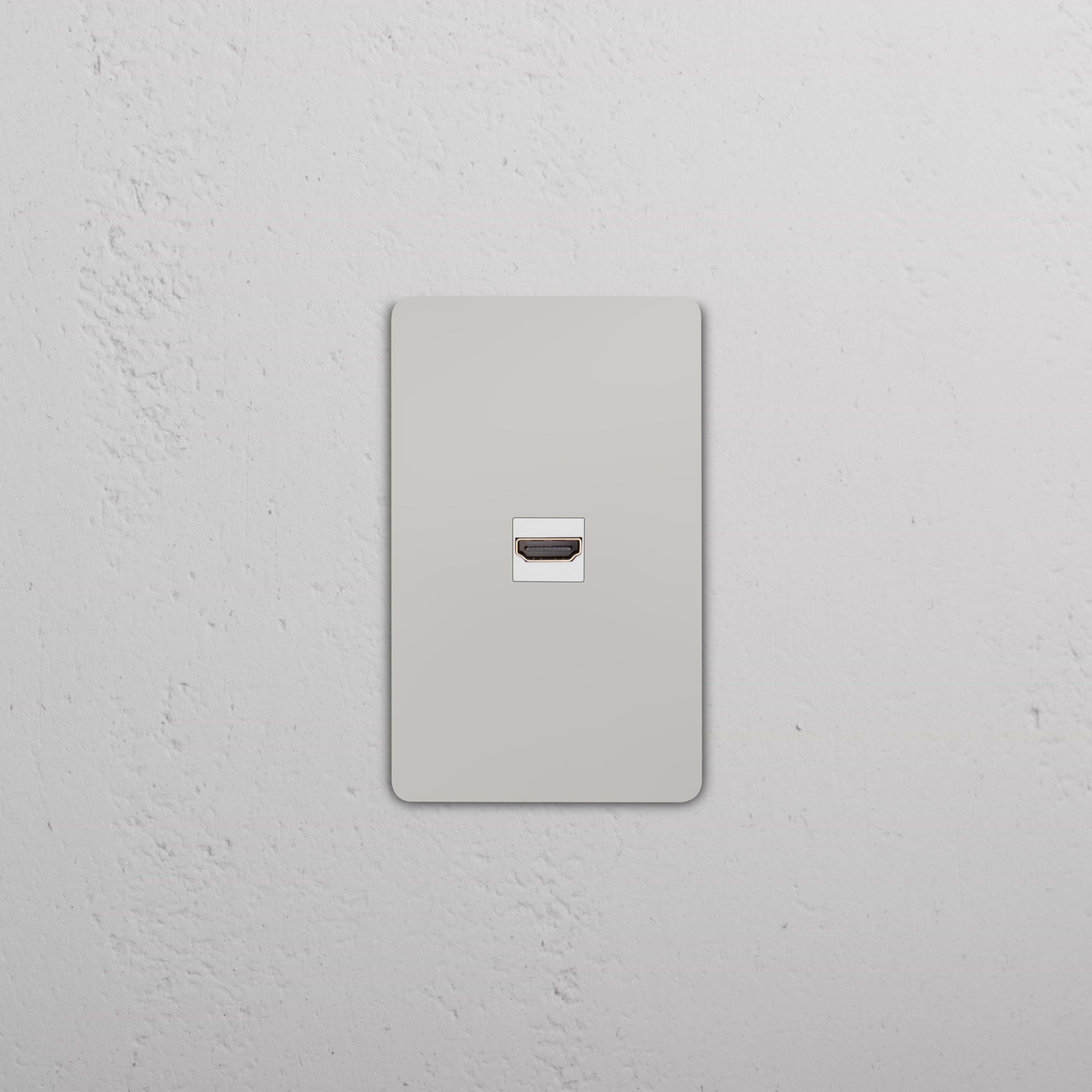 Grove 1G HDMI Keystone in polished nickel on a white wall plate, designed for HDMI connectivity.