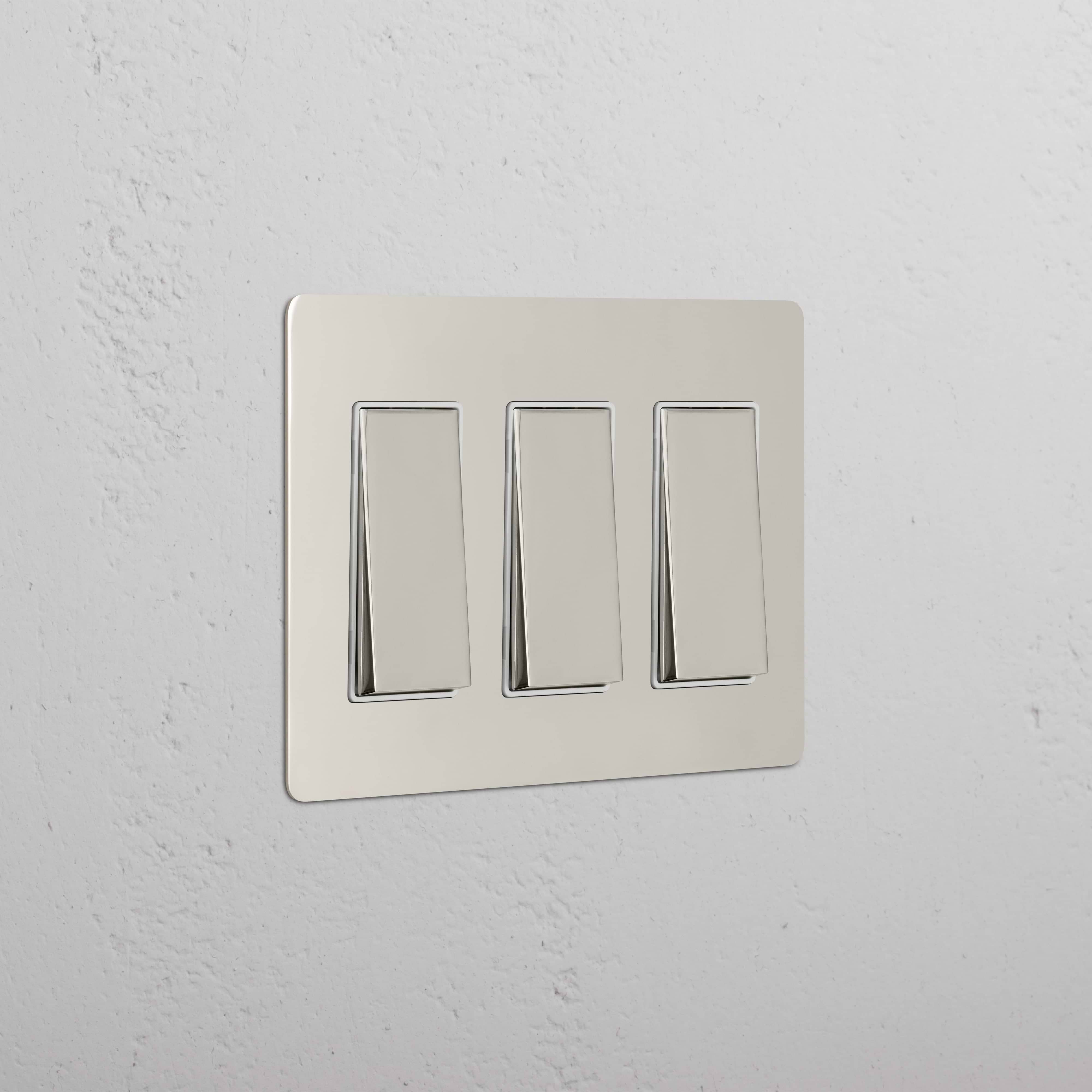 Kew 3G Rocker Switch in Polished Nickel White featuring three white rocker switches on a rectangular panel.