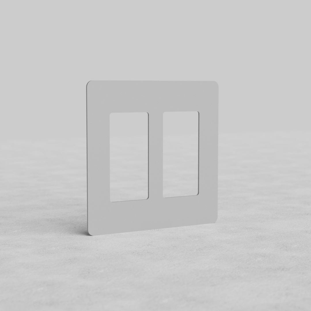 Rectangular, paintable 2G Outlet Plate Kew US designed for two US-style outlets on a plain background.