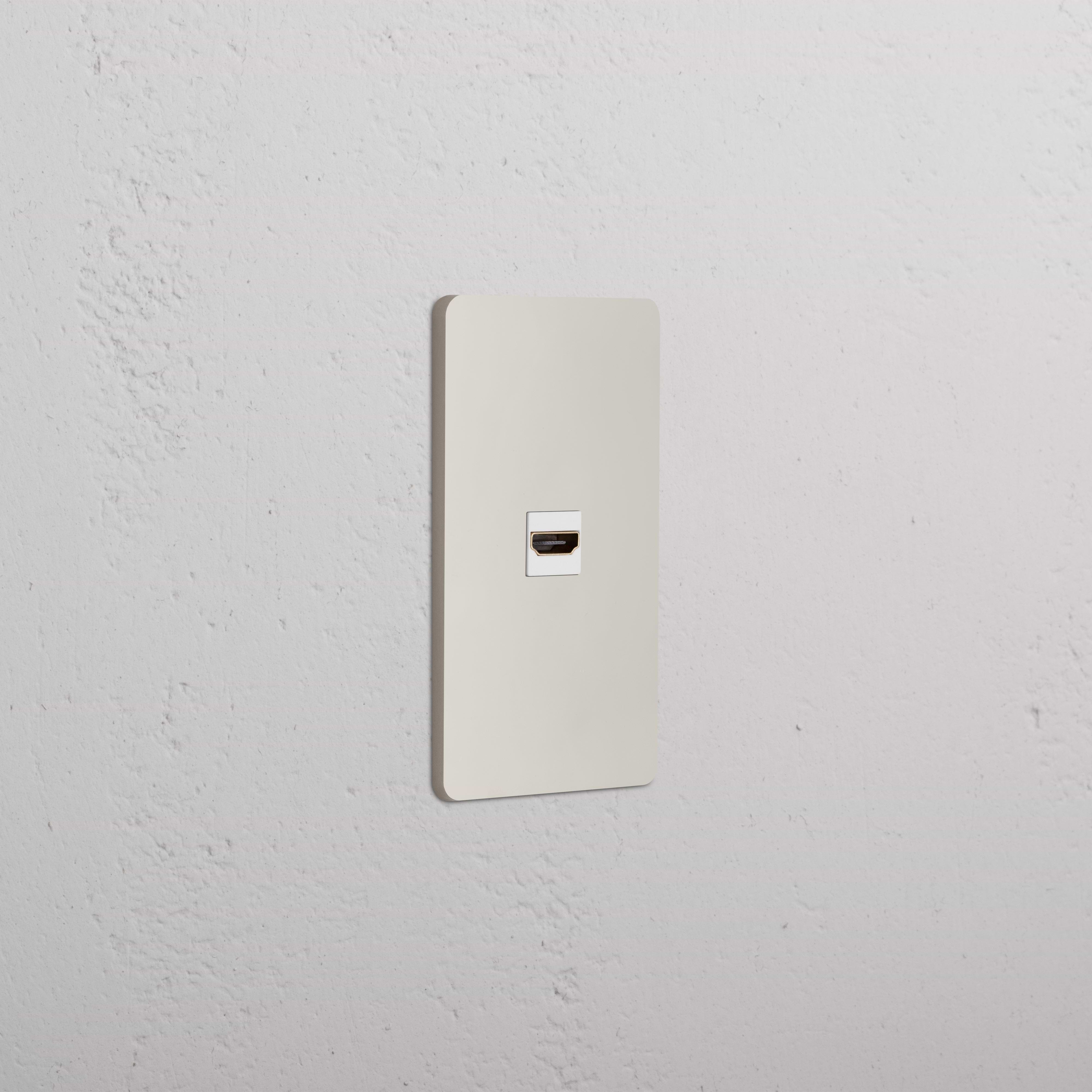 White Grove 1G HDMI Keystone wall plate in polished nickel with single HDMI port, mounted on a white wall.