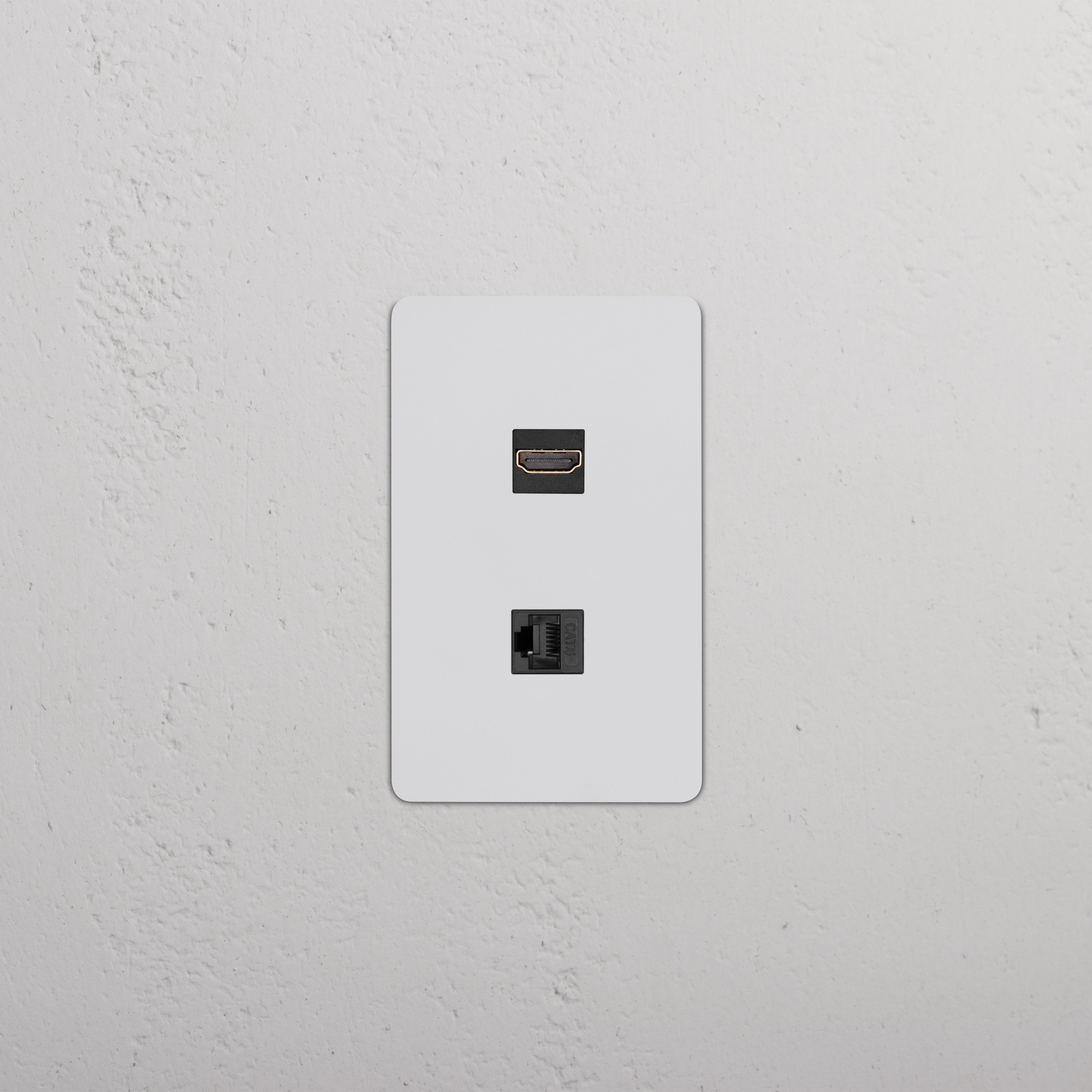 Kew 1G HDMI & CAT 6 Keystone, Paintable Black wall plate with HDMI and Ethernet ports.