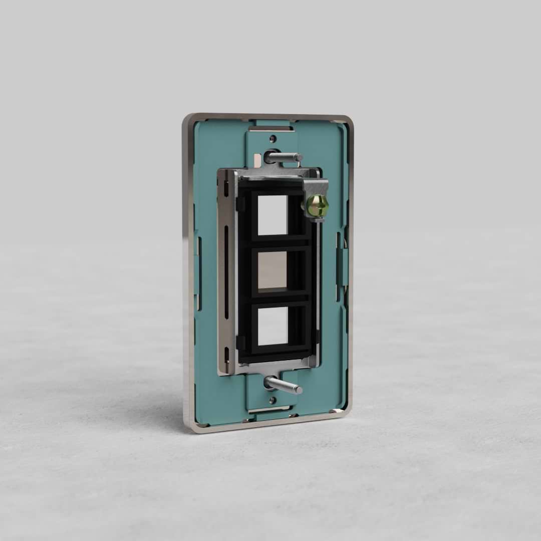 Polished nickel 1G 2x Keystone Plate Grove US with two keystone openings for network modules, shown on gray surface.