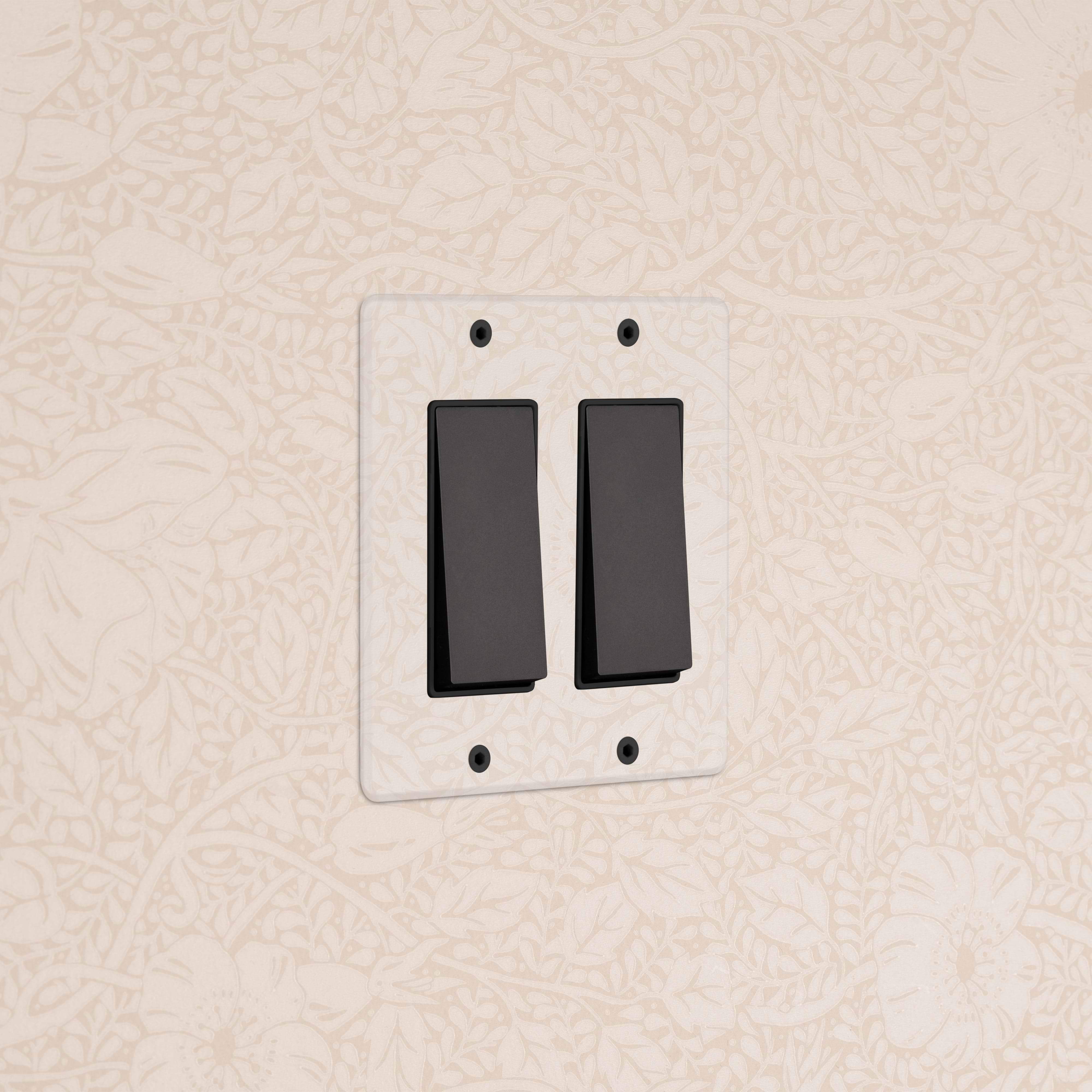 Kew 2G Rocker Switch in Clear Bronze Black finish, featuring two black switches on a stylish faceplate.