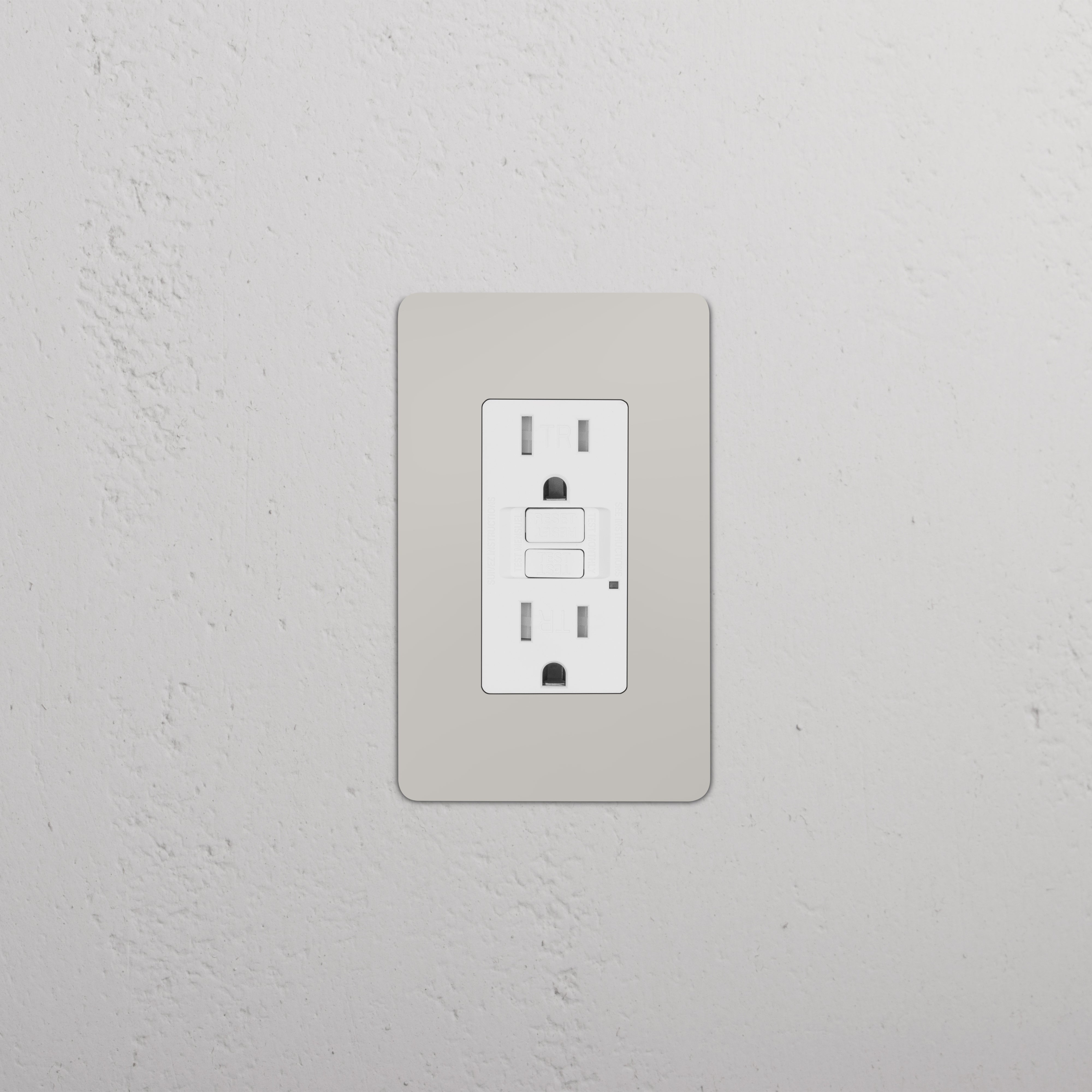 Kew 1G 15A GFCI Outlet in polished nickel white with two sockets and reset/test buttons on a wall.
