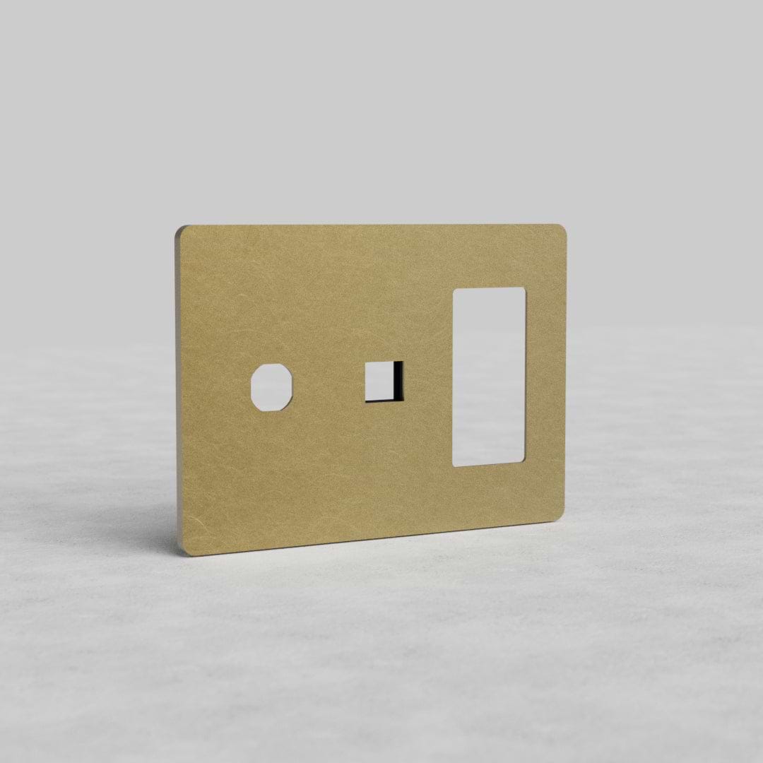 Antique brass 3-gang outlet, keystone, and switch plate (Grove US) with three cut-outs in a row.