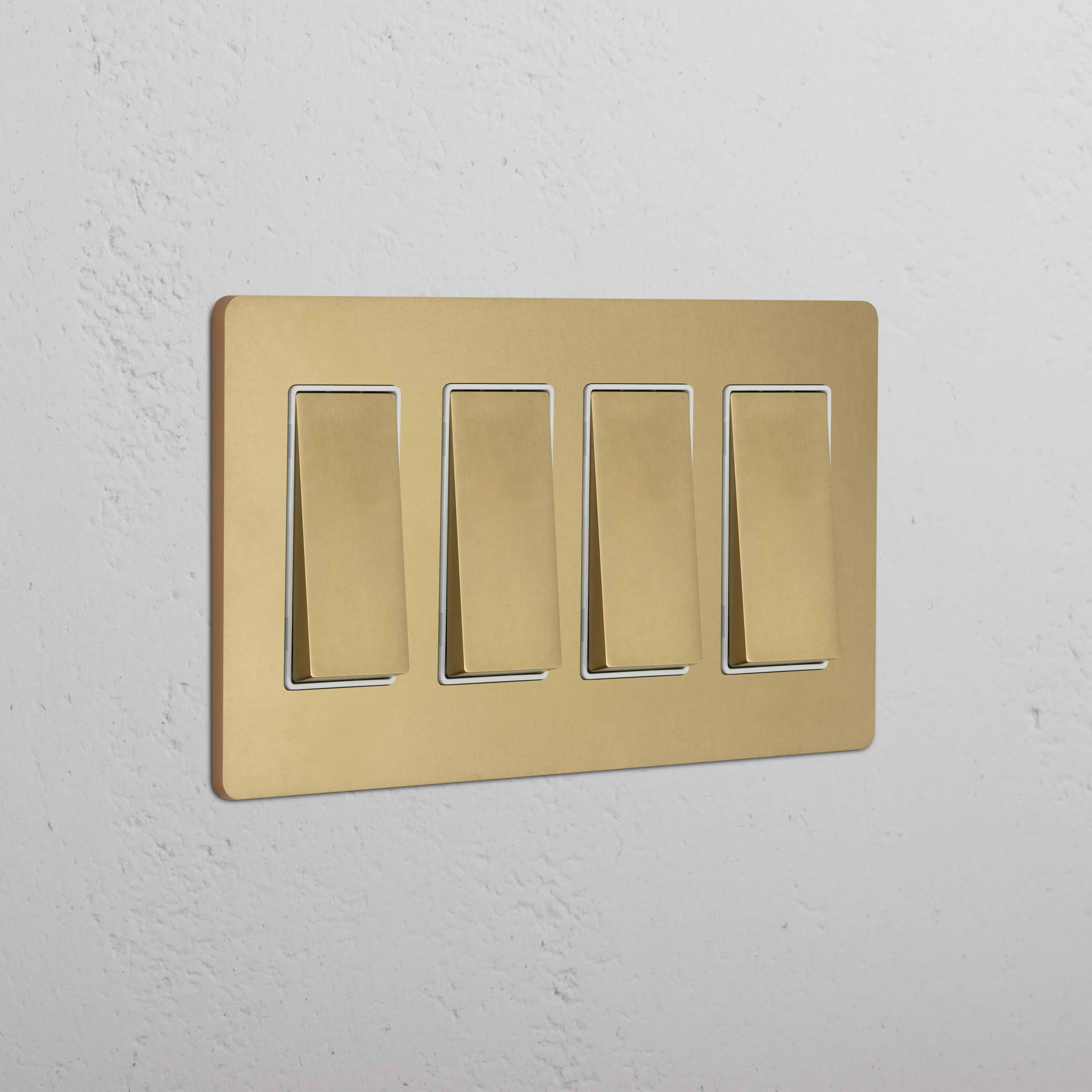 Grove 4G Rocker Switch in antique brass white finish, with four rectangular rocker switches.