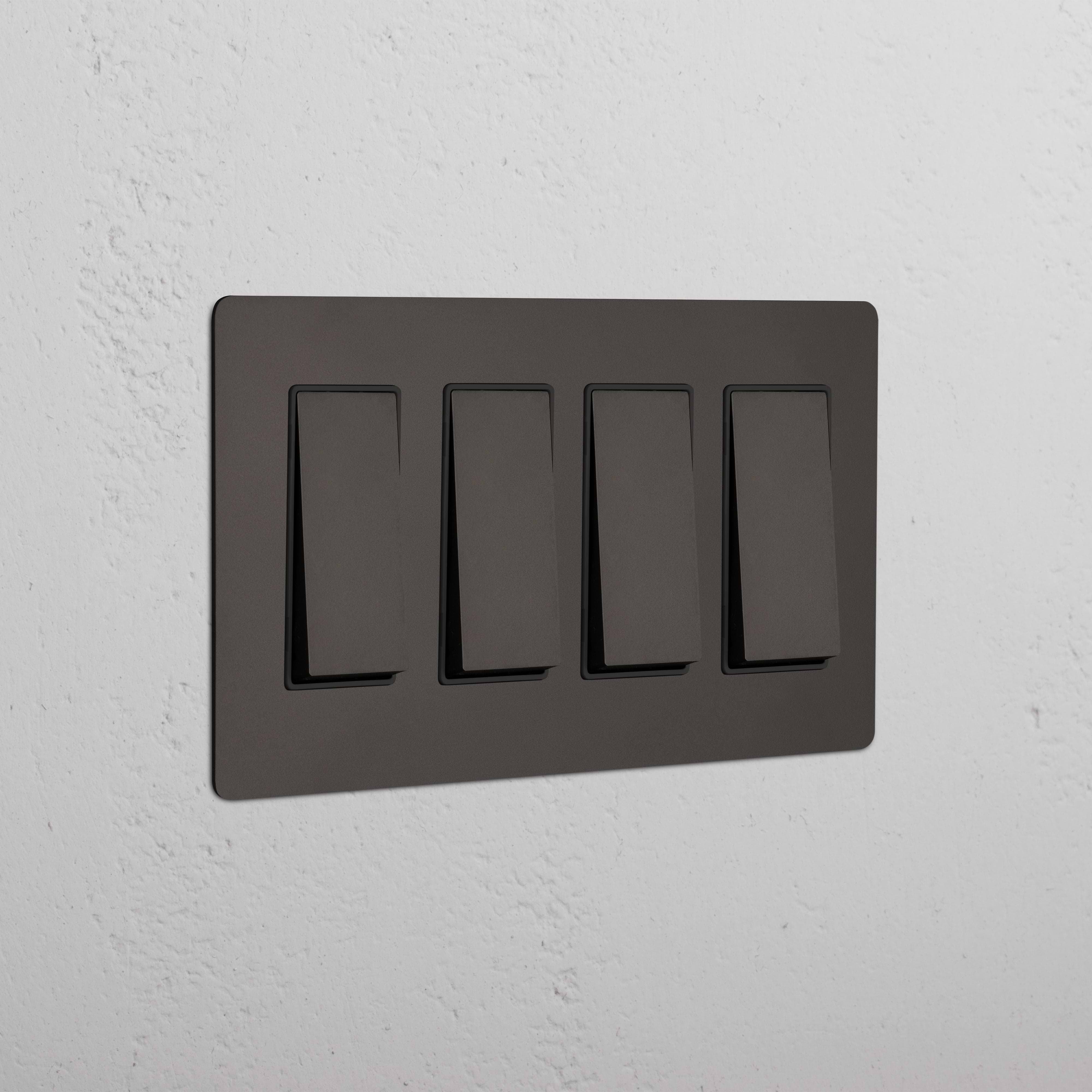 Kew 4G Rocker Switch in bronze black finish, featuring four switches on a rectangular plate.