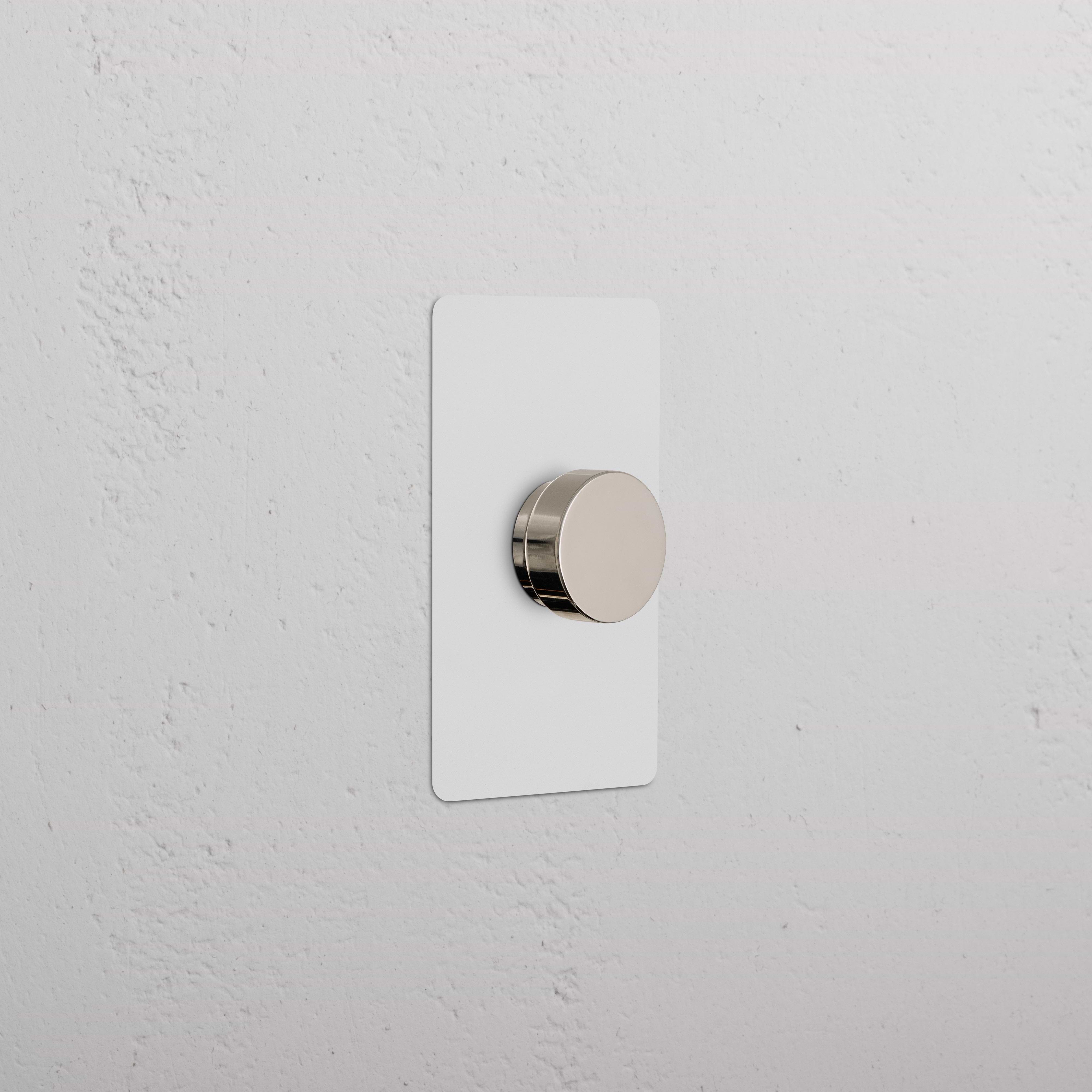 Kew 1G Dimmer Switch in paintable polished nickel finish, with a round knob and rectangular plate.