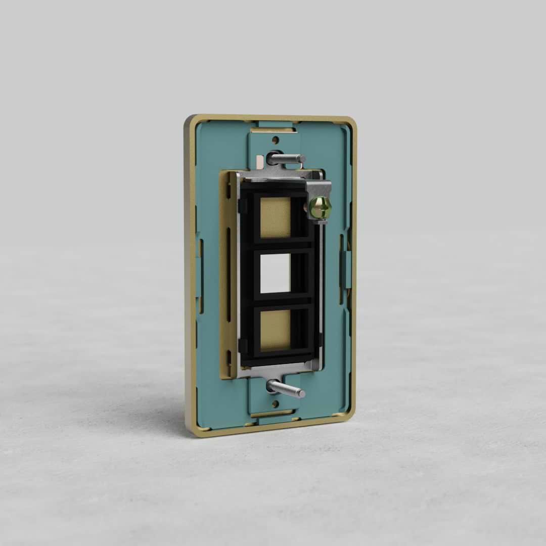 Antique Brass 1G Keystone Plate Grove US for network or AV modules, shown on a plain light gray background.