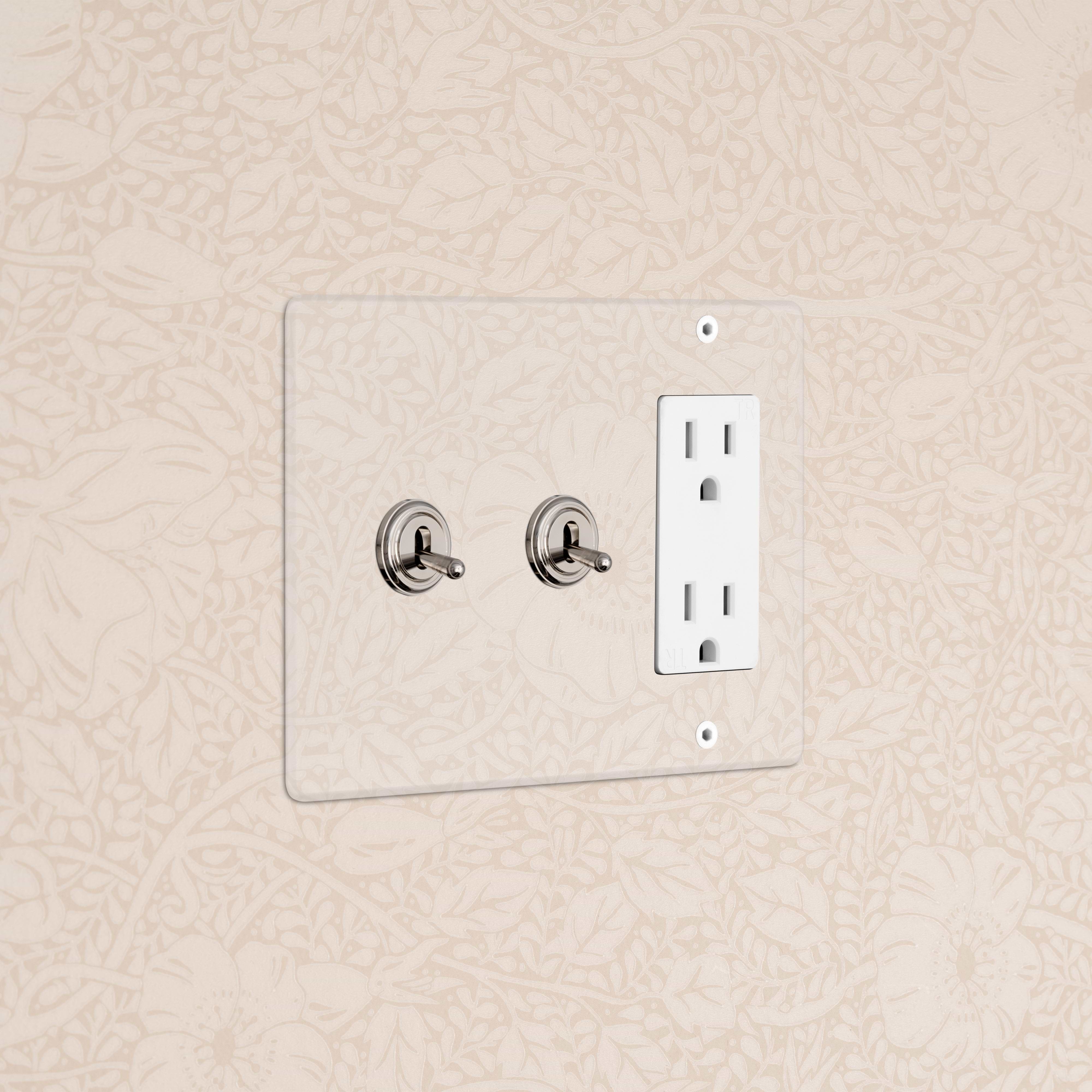 Kew 3G 2x Toggle Switch & Outlet in Clear Polished Nickel White, featuring two toggles and one outlet.