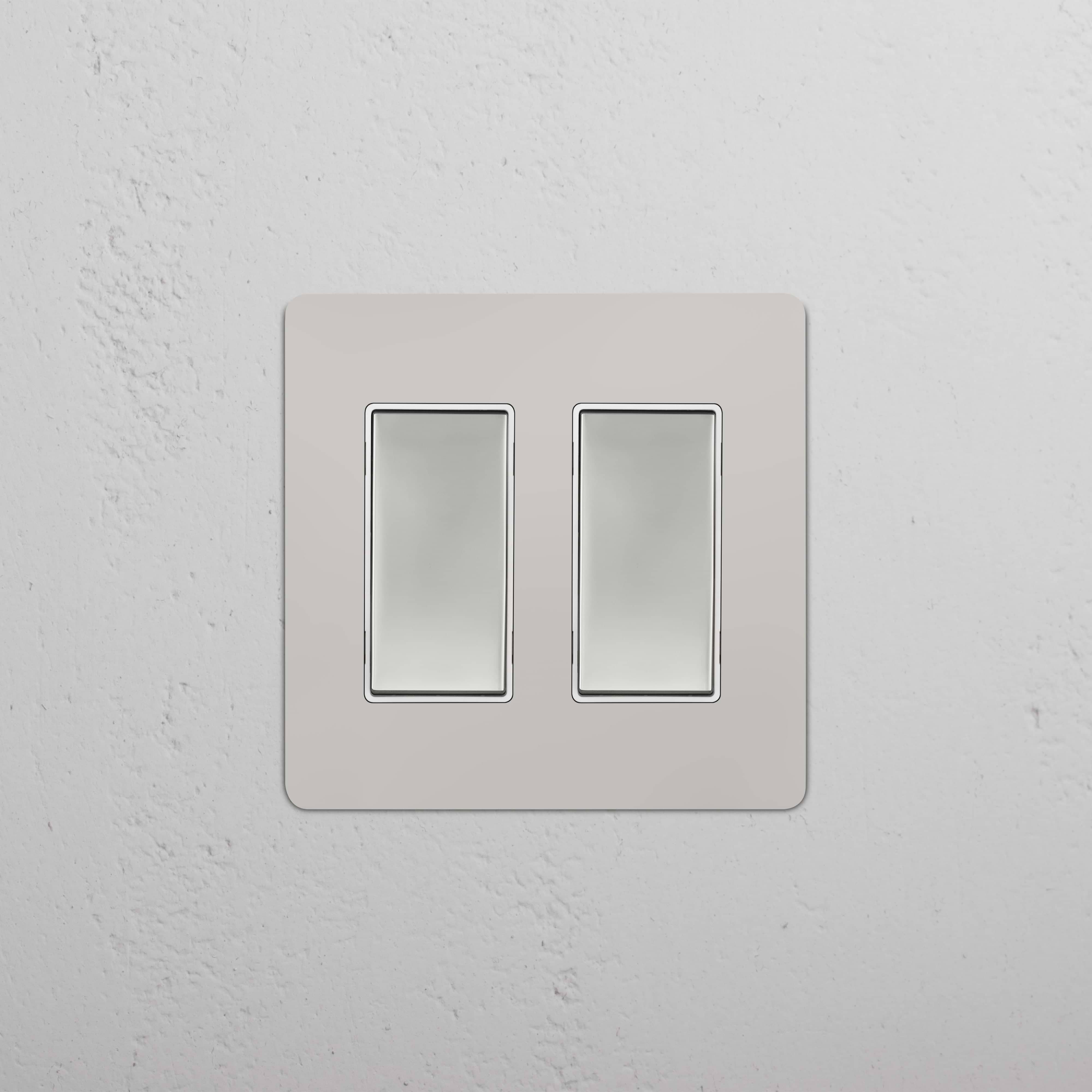 Kew 2G Rocker Switch in Polished Nickel White finish, featuring two rectangular rocker switches.