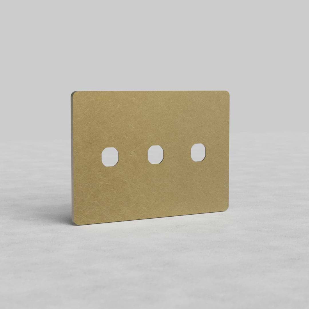 3G Switch Plate Grove US in antique brass finish, featuring three switch apertures on a rectangular plate.