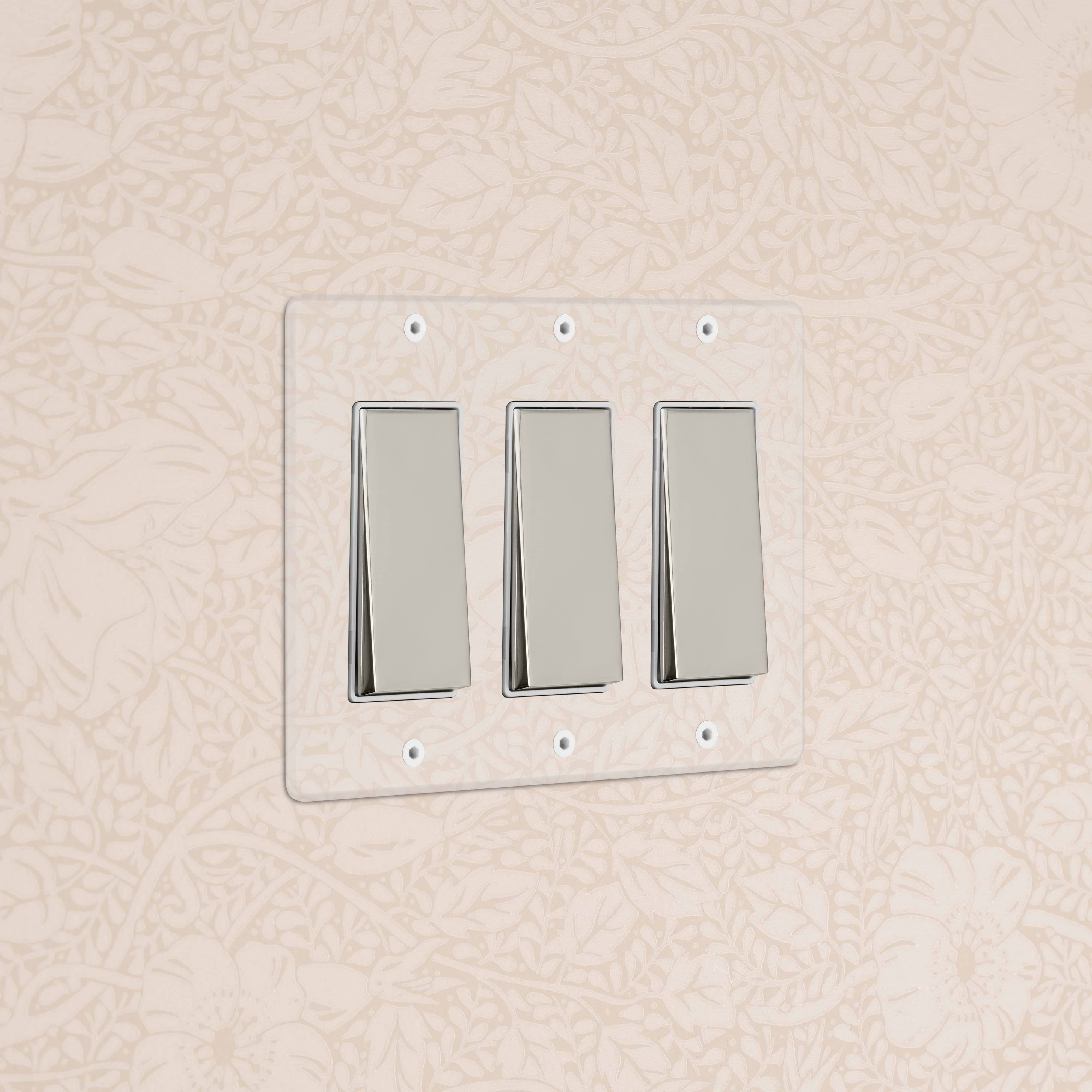 Kew 3G Rocker Switch in clear polished nickel and white finish, mounted on a wall.