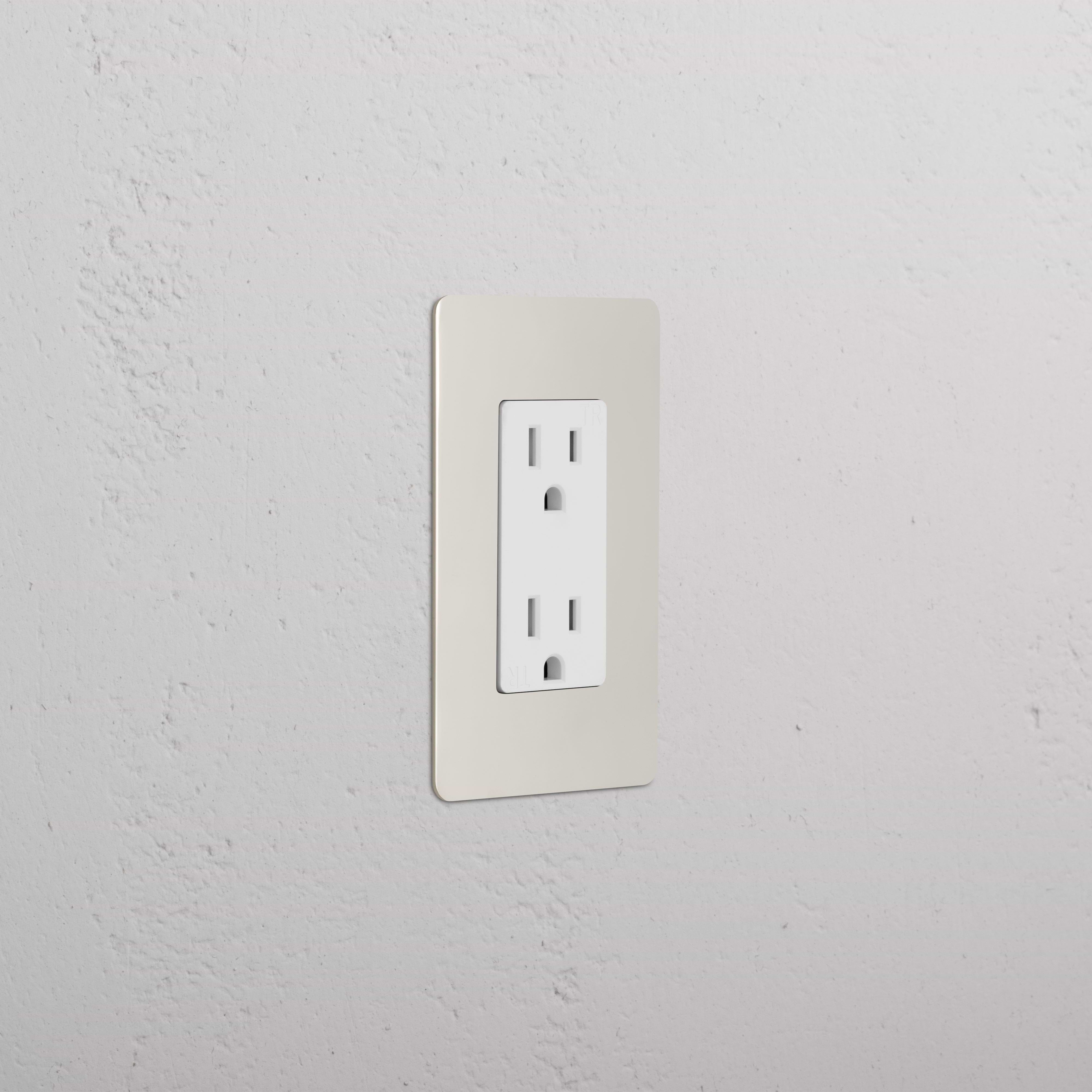 Kew 1G 15A outlet in polished nickel white finish, single socket, shown mounted on a white wall.