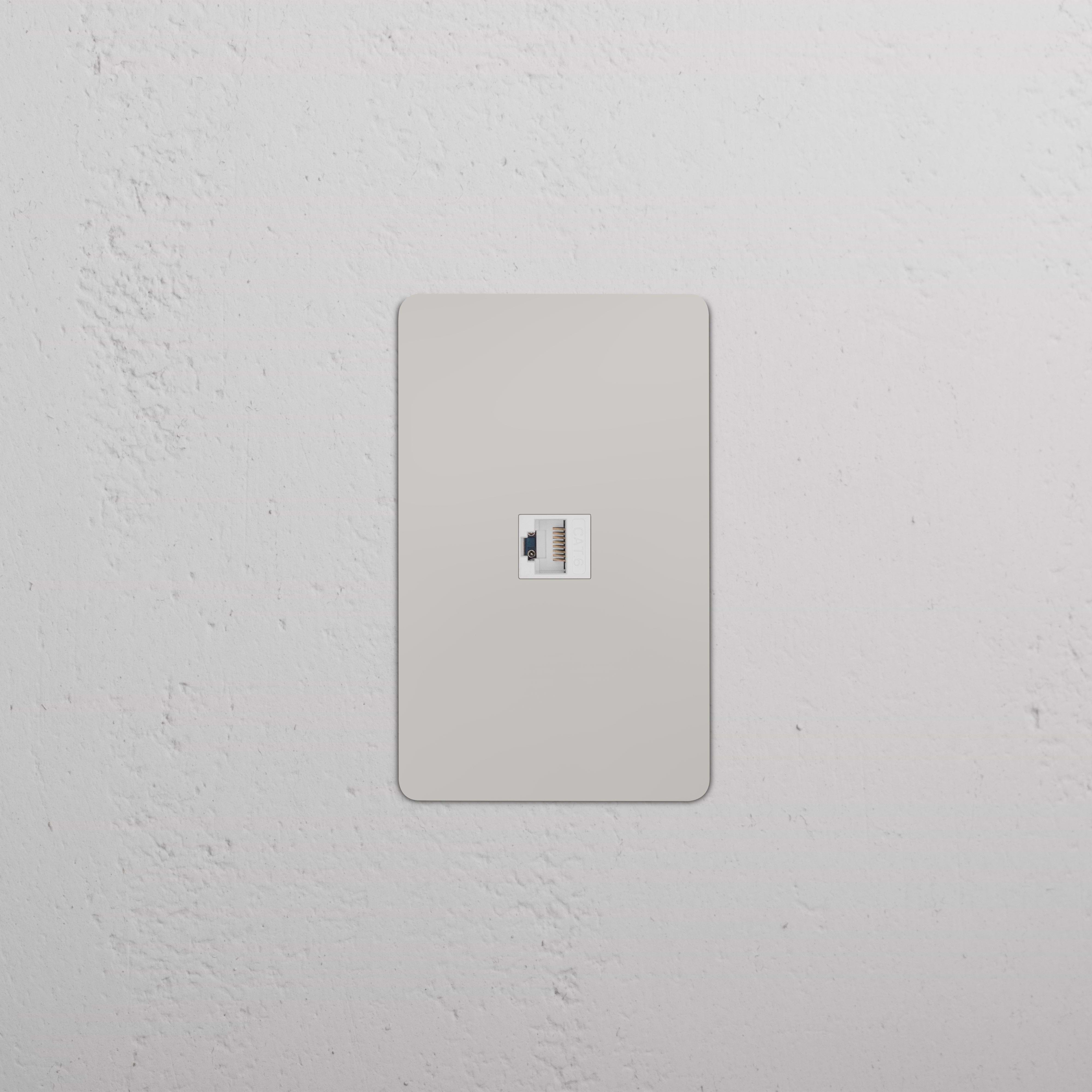 Kew 1G CAT 6 Keystone Ethernet wall plate with Polished Nickel White finish, shown mounted on a wall.