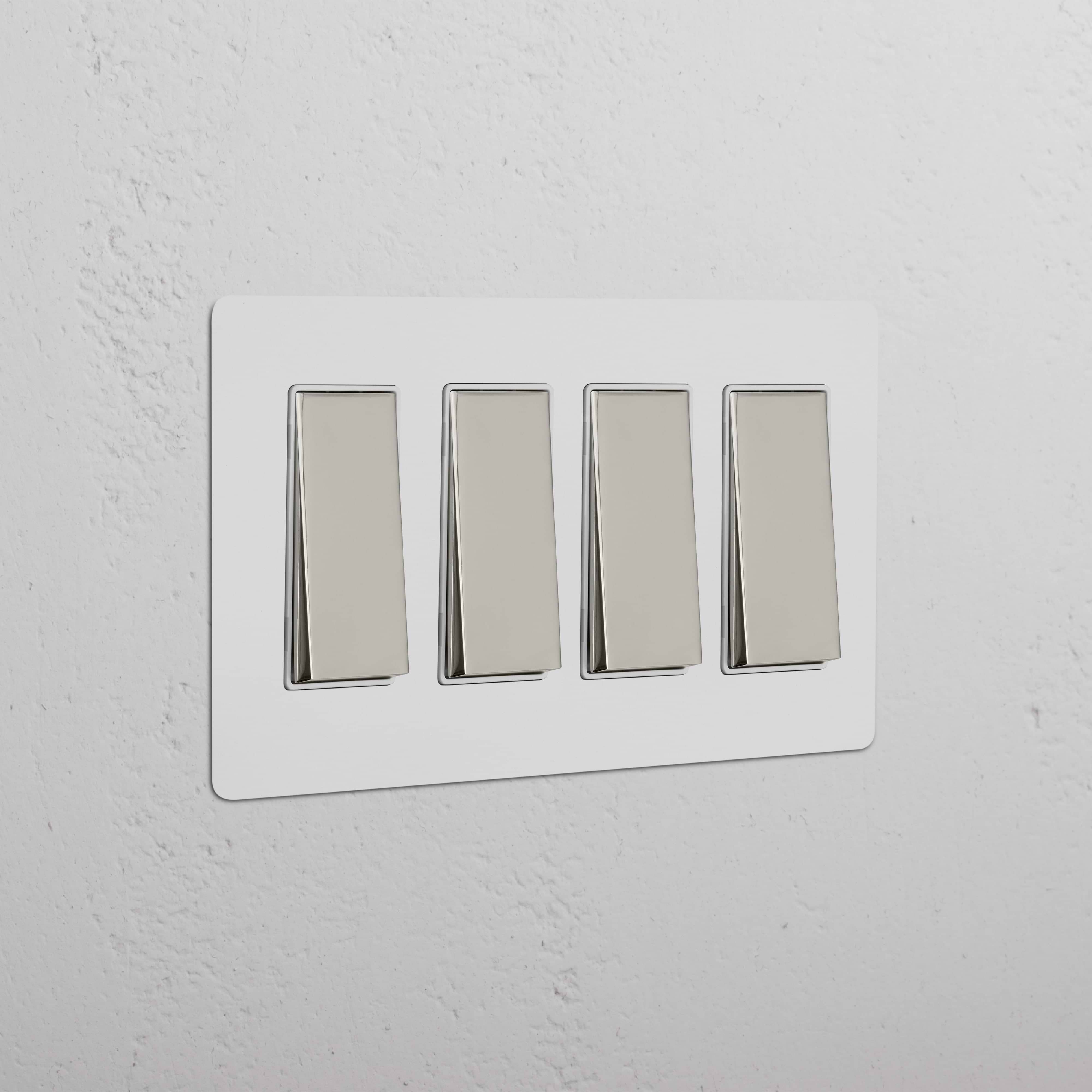 Kew 4G Rocker Switch in Paintable Polished Nickel White with four silver rocker switches on a white plate.