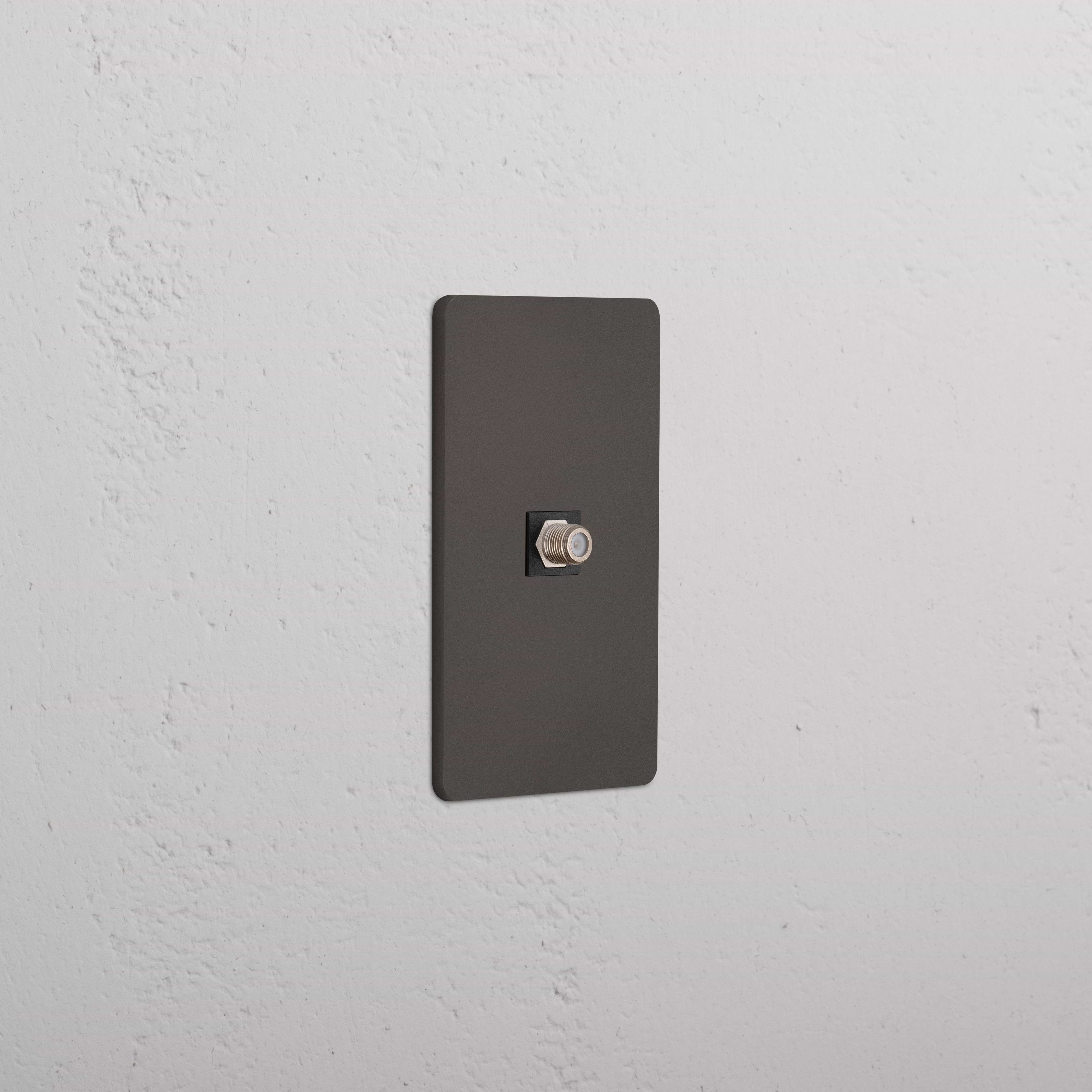 Bronze Black Grove 1G Satellite Keystone module, designed for connectivity, shown mounted on a white wall.