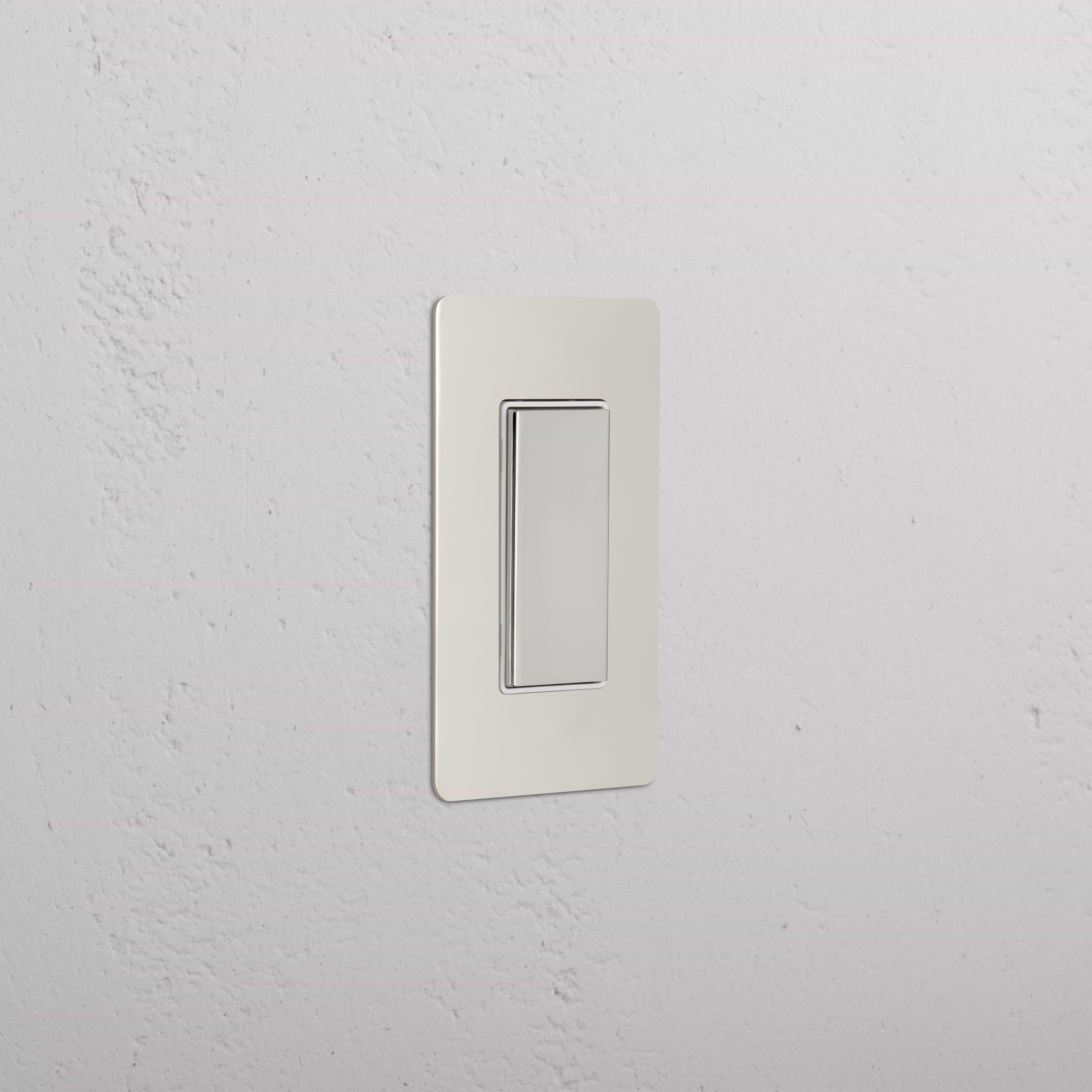 Kew 1G Center Retractive Rocker Switch in polished nickel white with a modern, rectangular design.