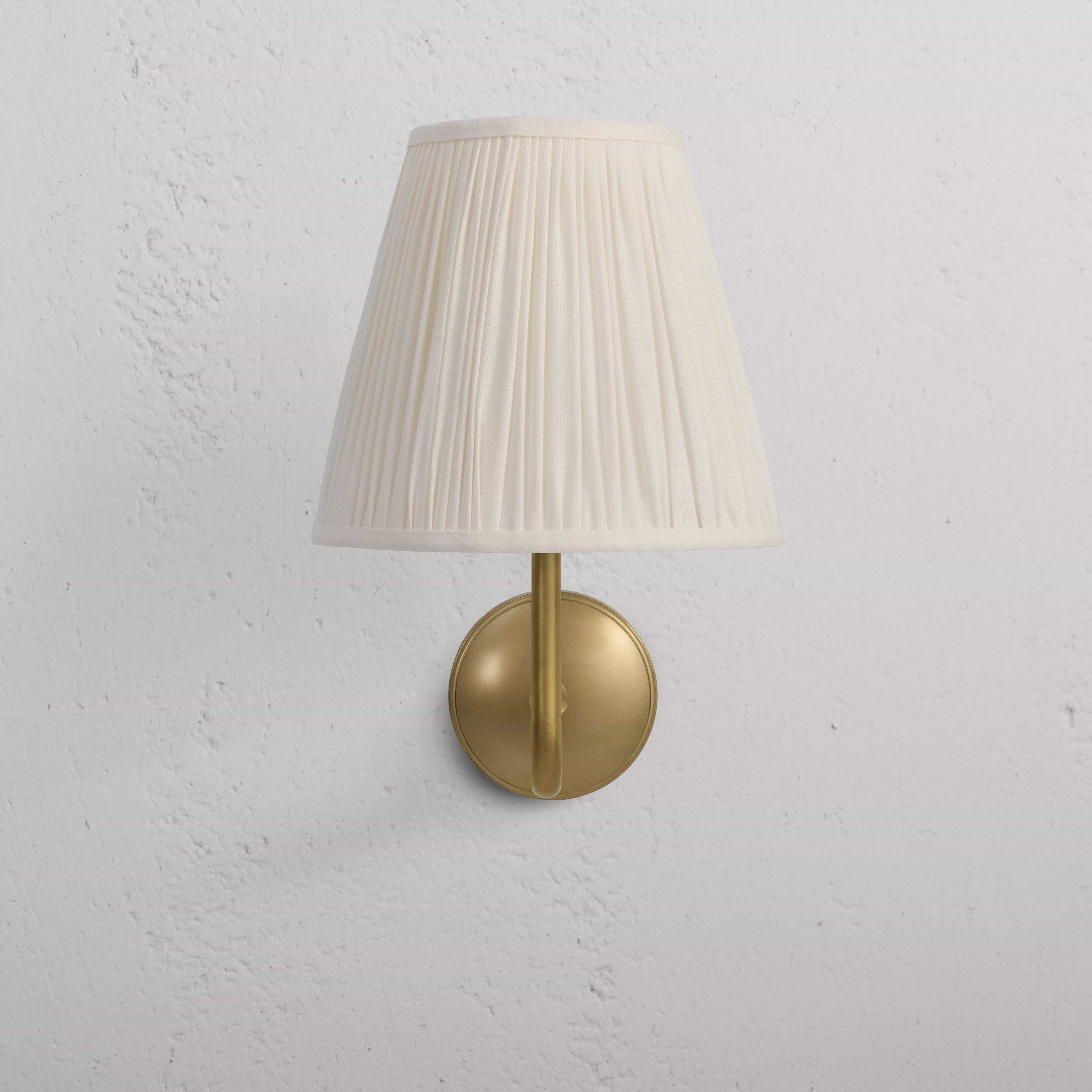 Large Malvern Wall Light Alabaster White with antique brass base and white pleated shade, wall-mounted.