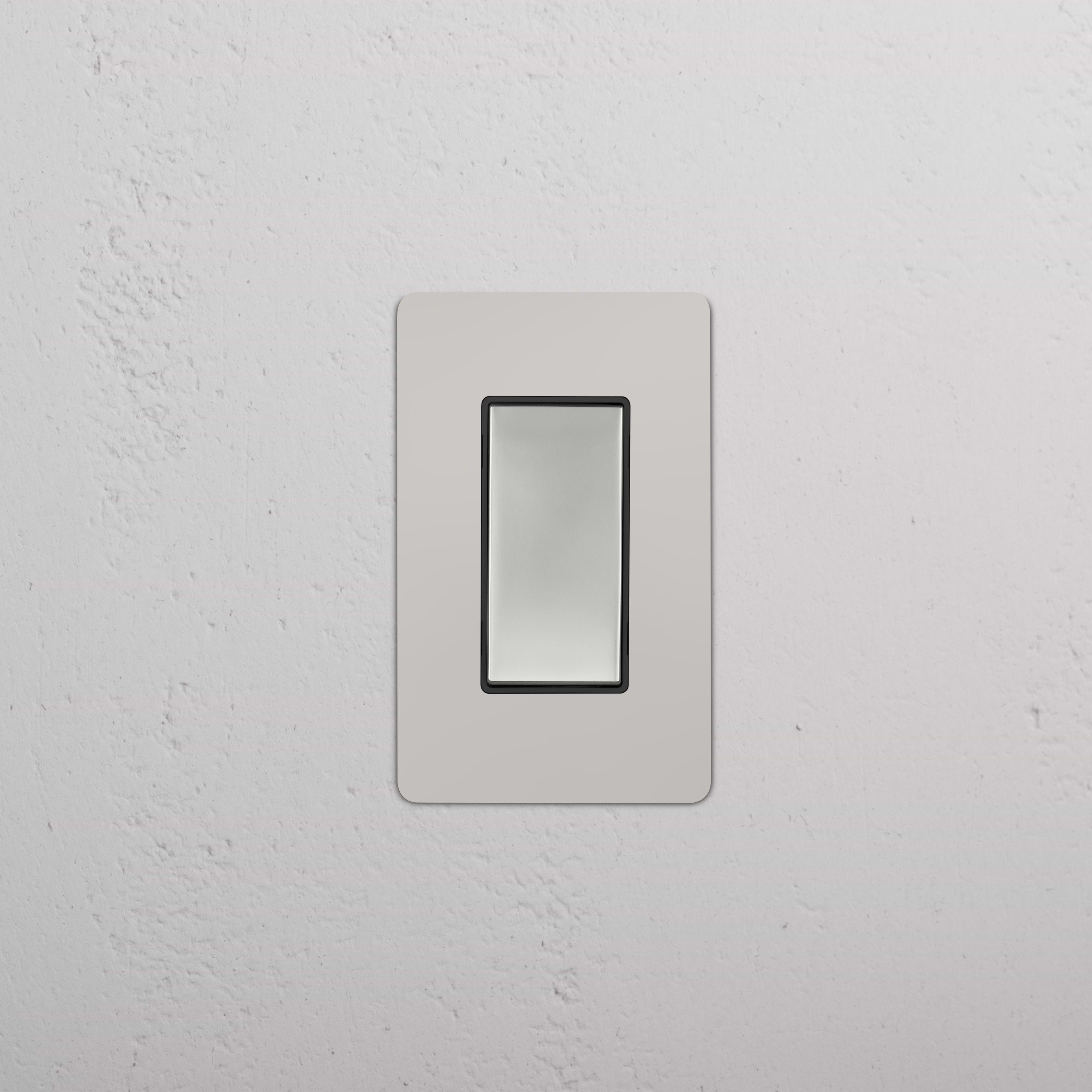 Kew 1G Double Pole Rocker Switch in polished nickel black with a sleek rectangular design.