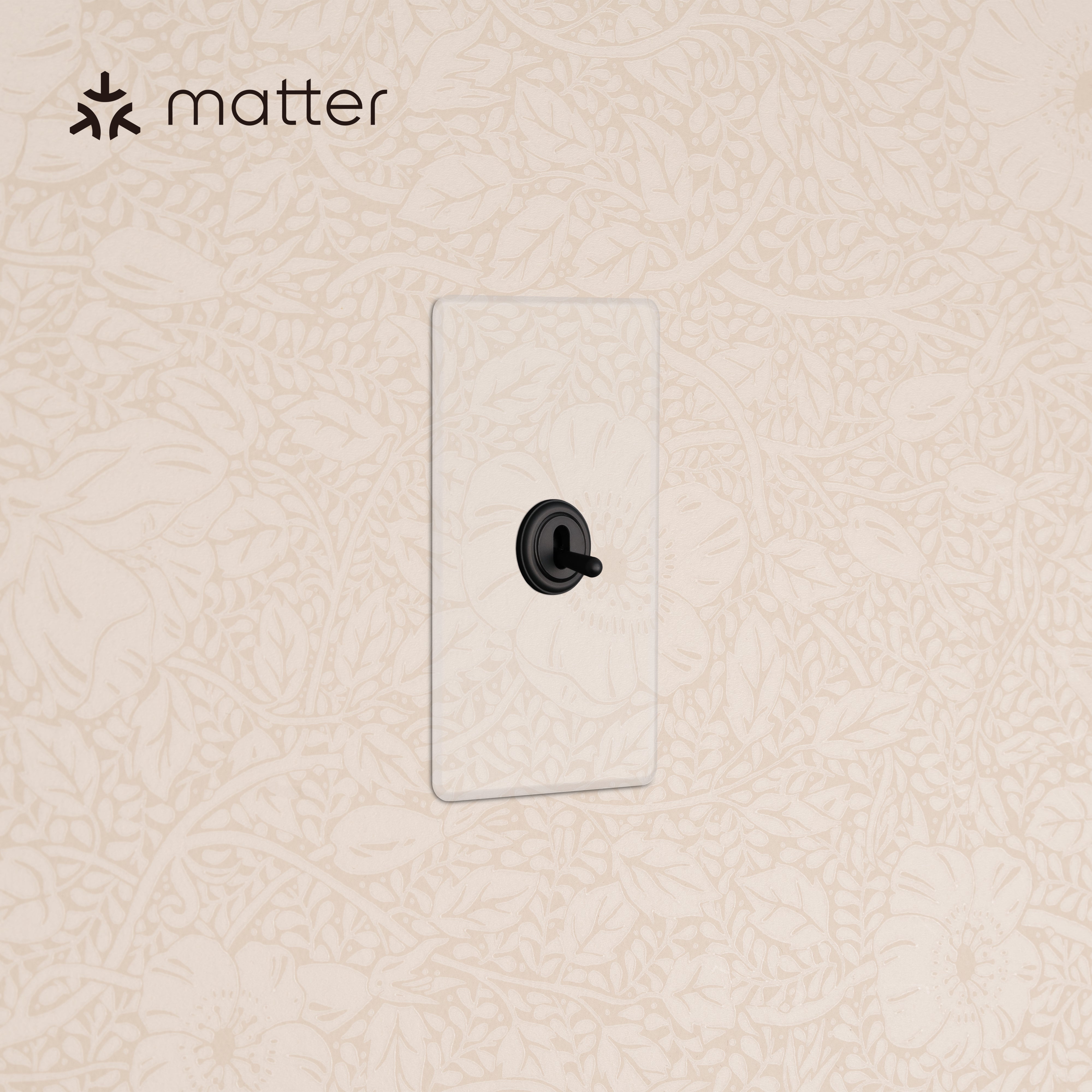 Kew 1G Smart Retractive Toggle Switch - Clear Bronze with rectangular clear bronze cover plate on wall.