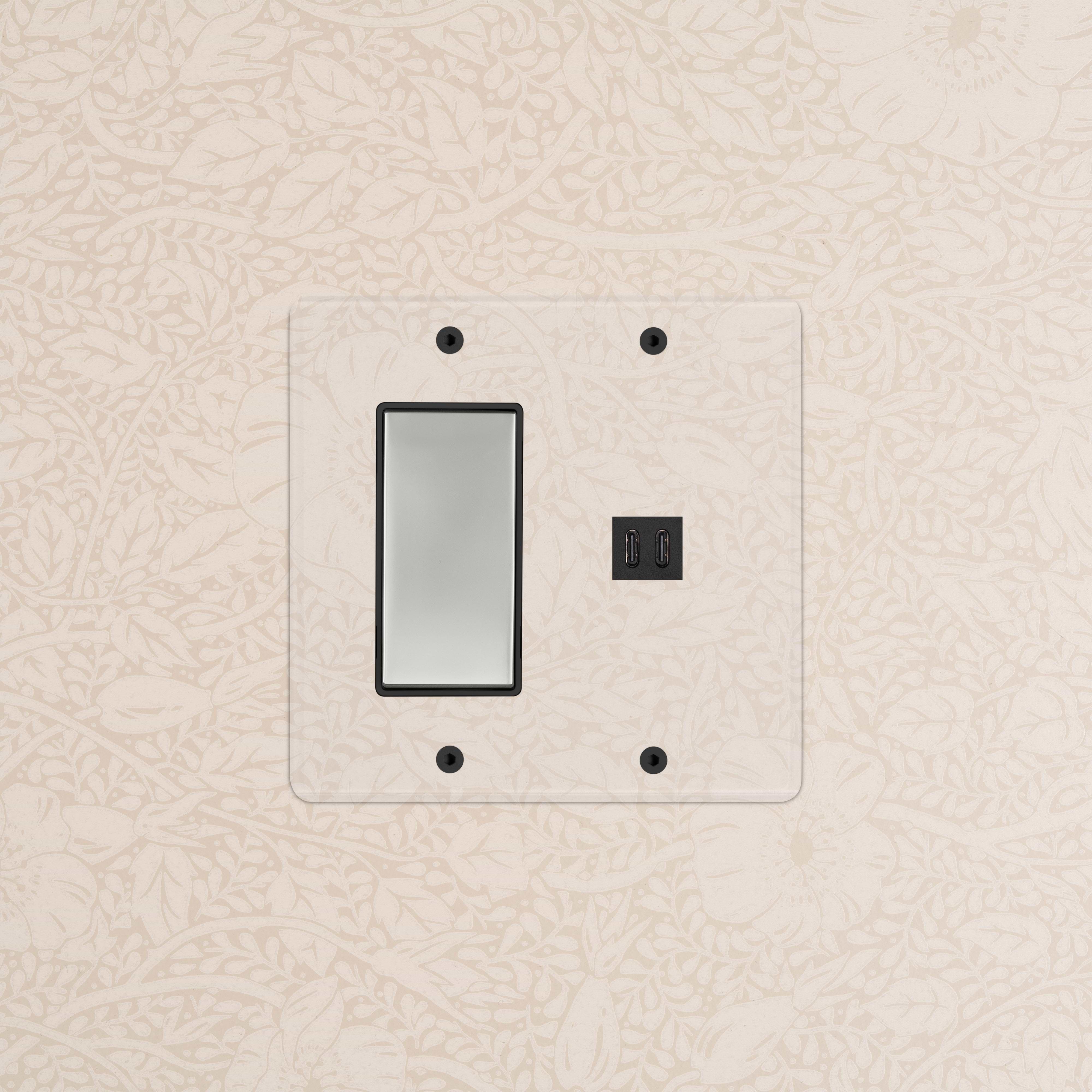 Kew 2G Rocker Switch & Fast Charge USB in clear polished nickel black finish, shown on a wall.