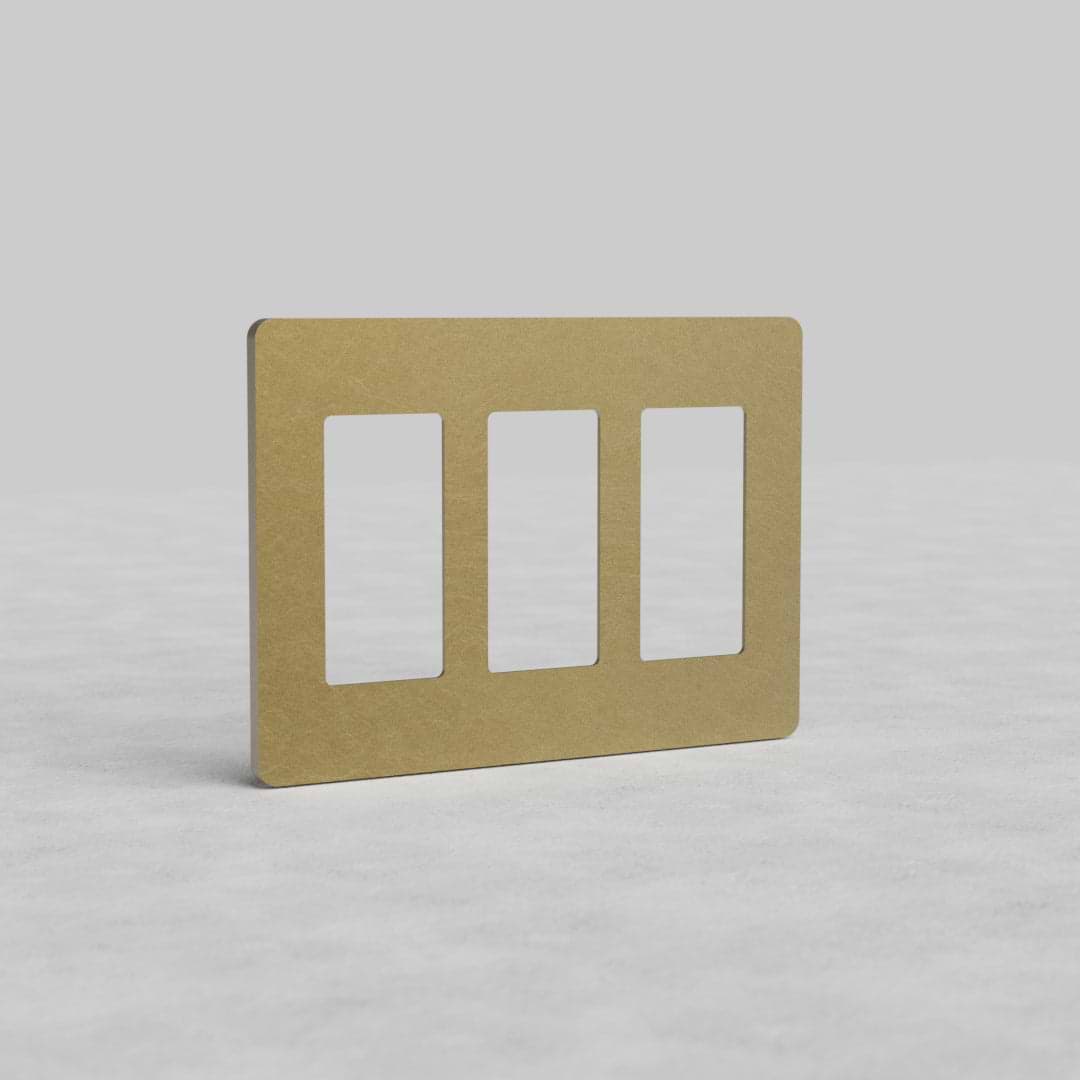 3G Outlet Plate Grove US in antique brass with three vertical rectangular openings, shown on a light background.