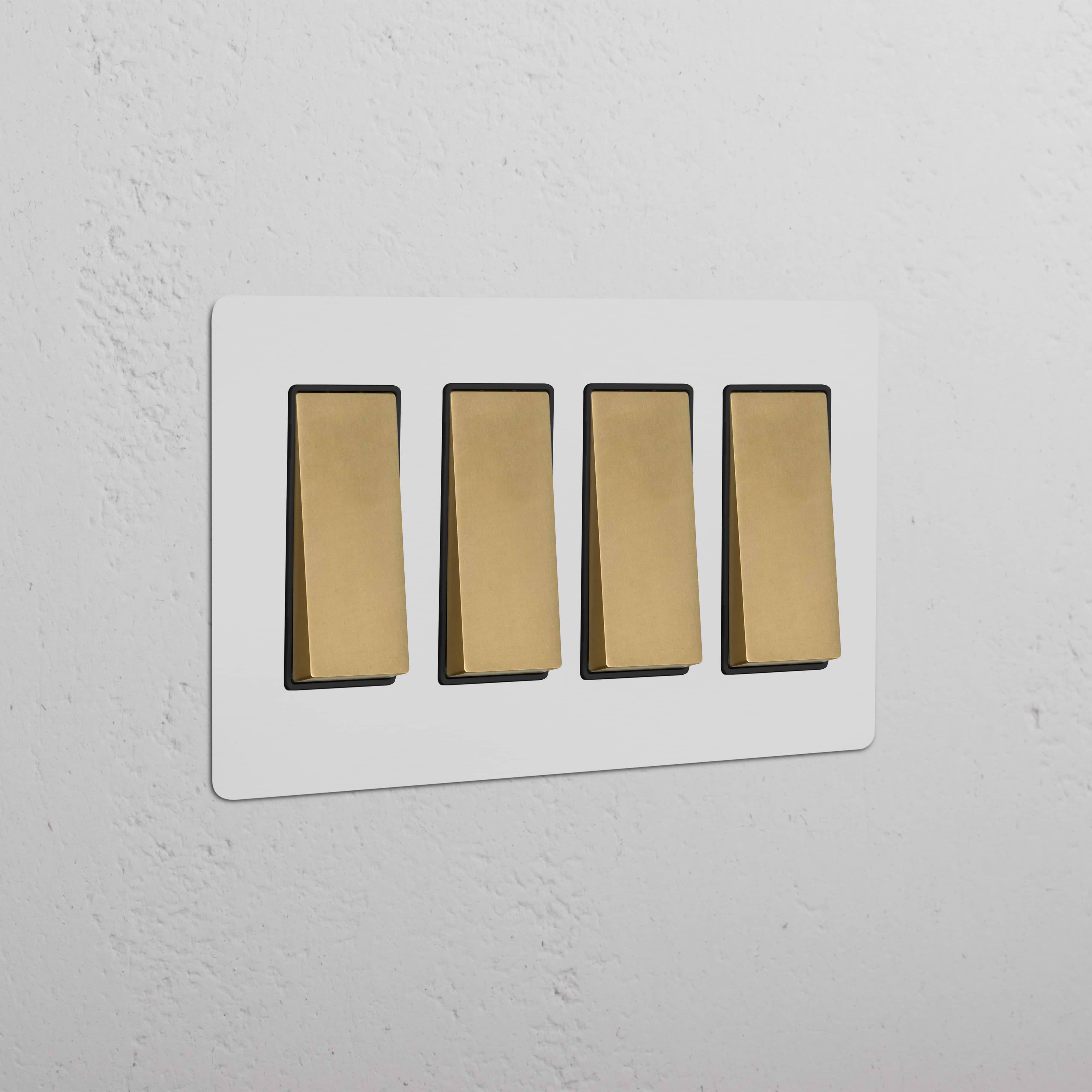 Kew 4G Rocker Switch in paintable antique brass black finish with four black rocker switches in a row.