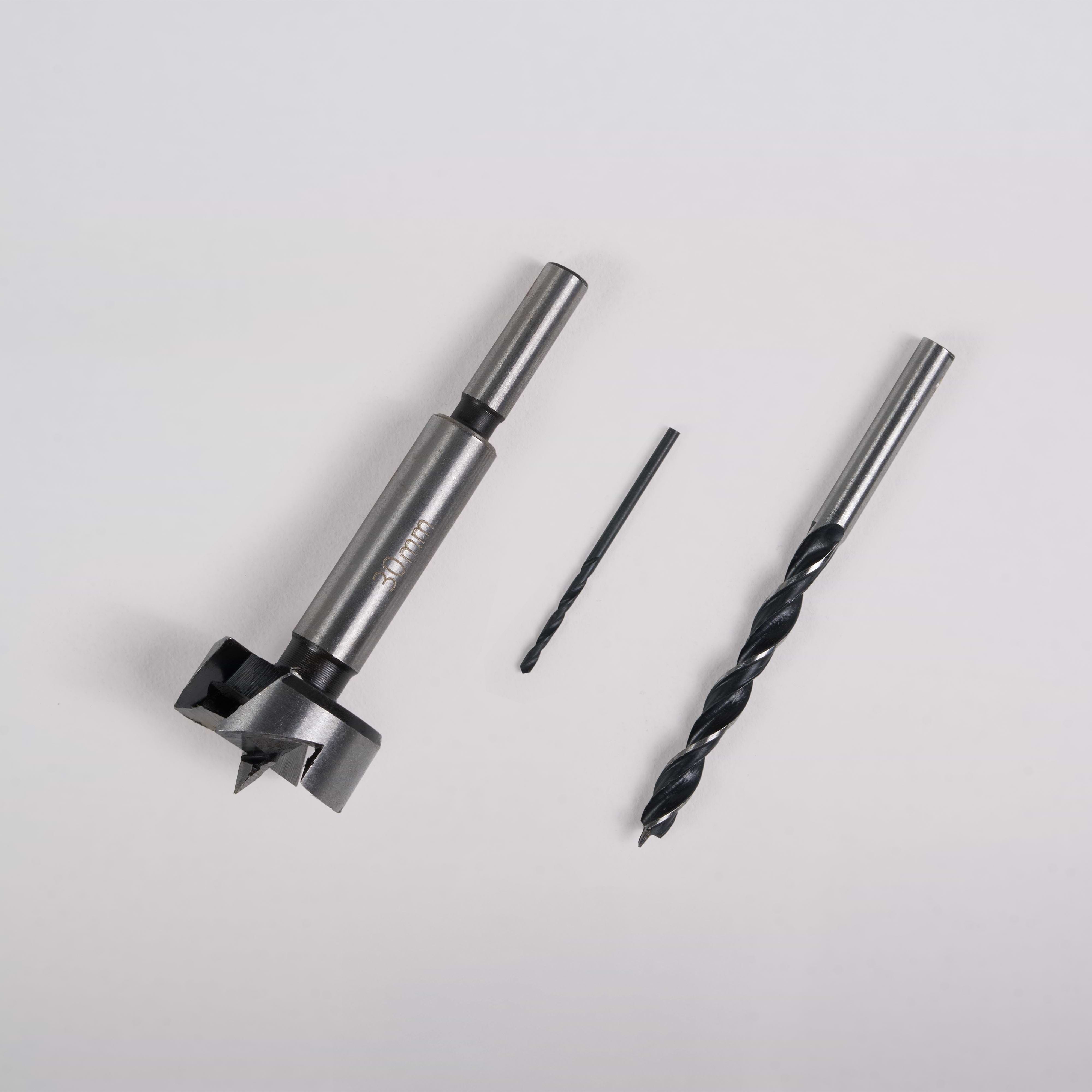 Three Door Handle Installation Drill Bits of different sizes arranged in a row on a light gray background.