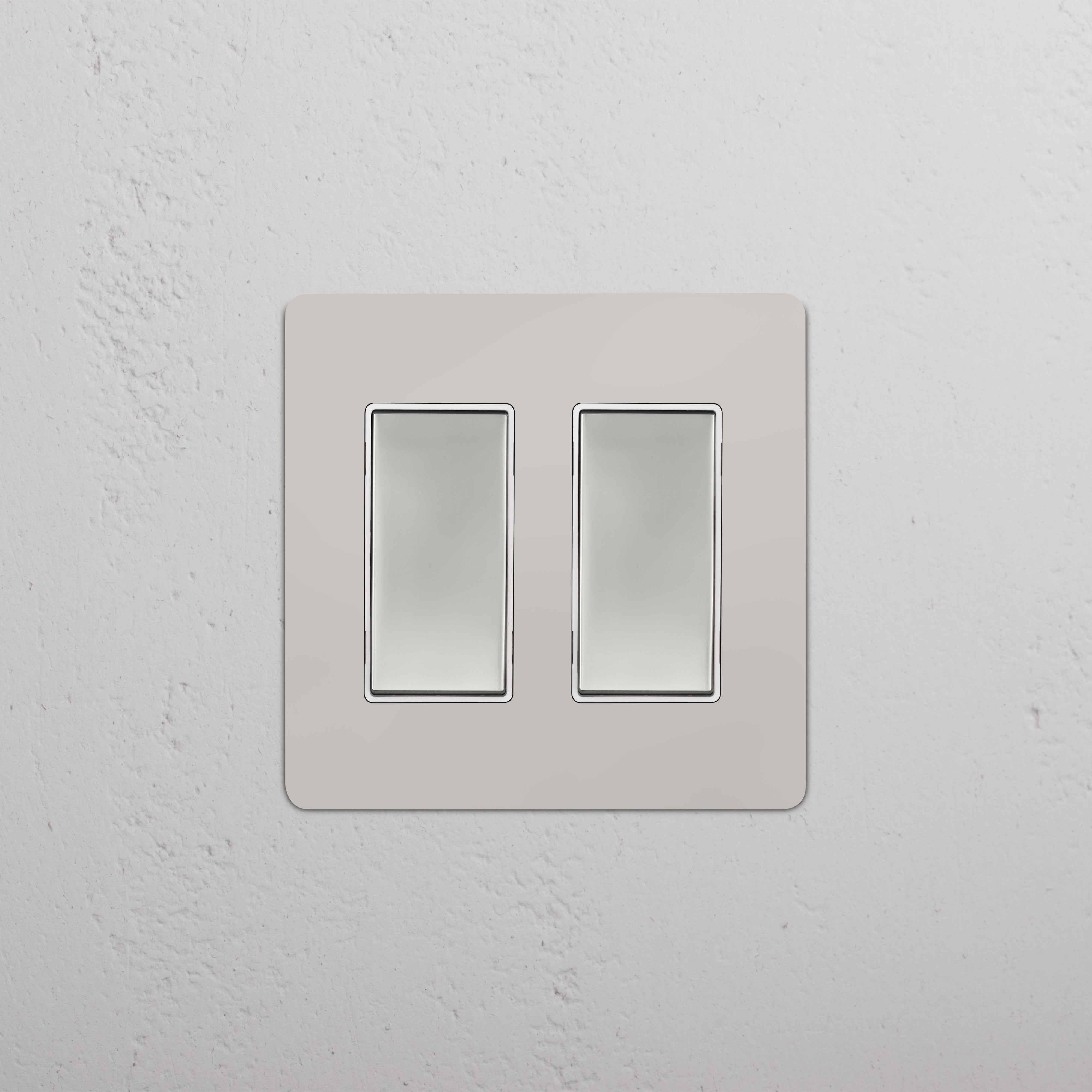 Kew 2G Rocker Switch in Polished Nickel White finish, featuring two rectangular rocker switches.