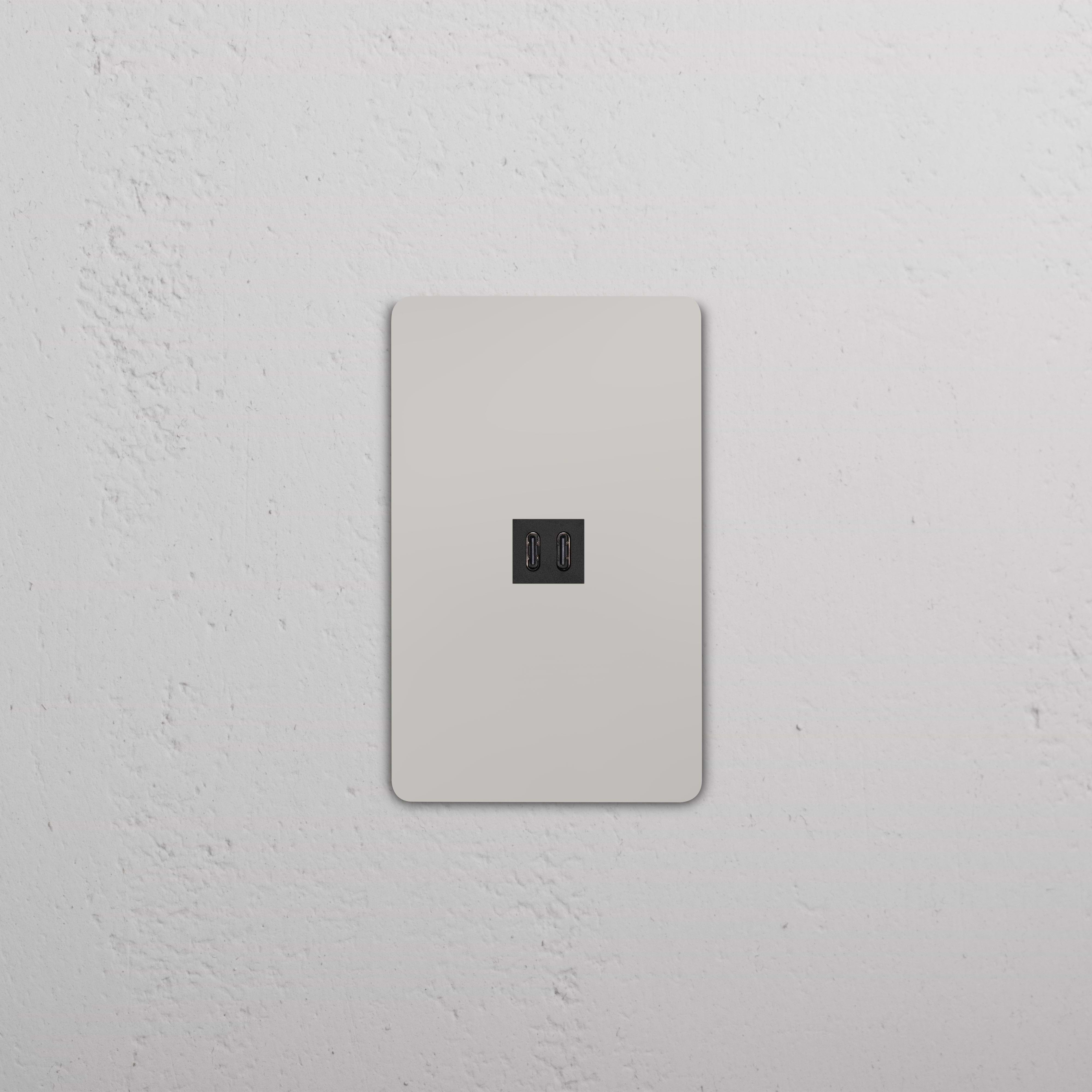 Grove 1G Fast Charge 45W USB Keystone in polished nickel black, shown on a wall plate for fast device charging.