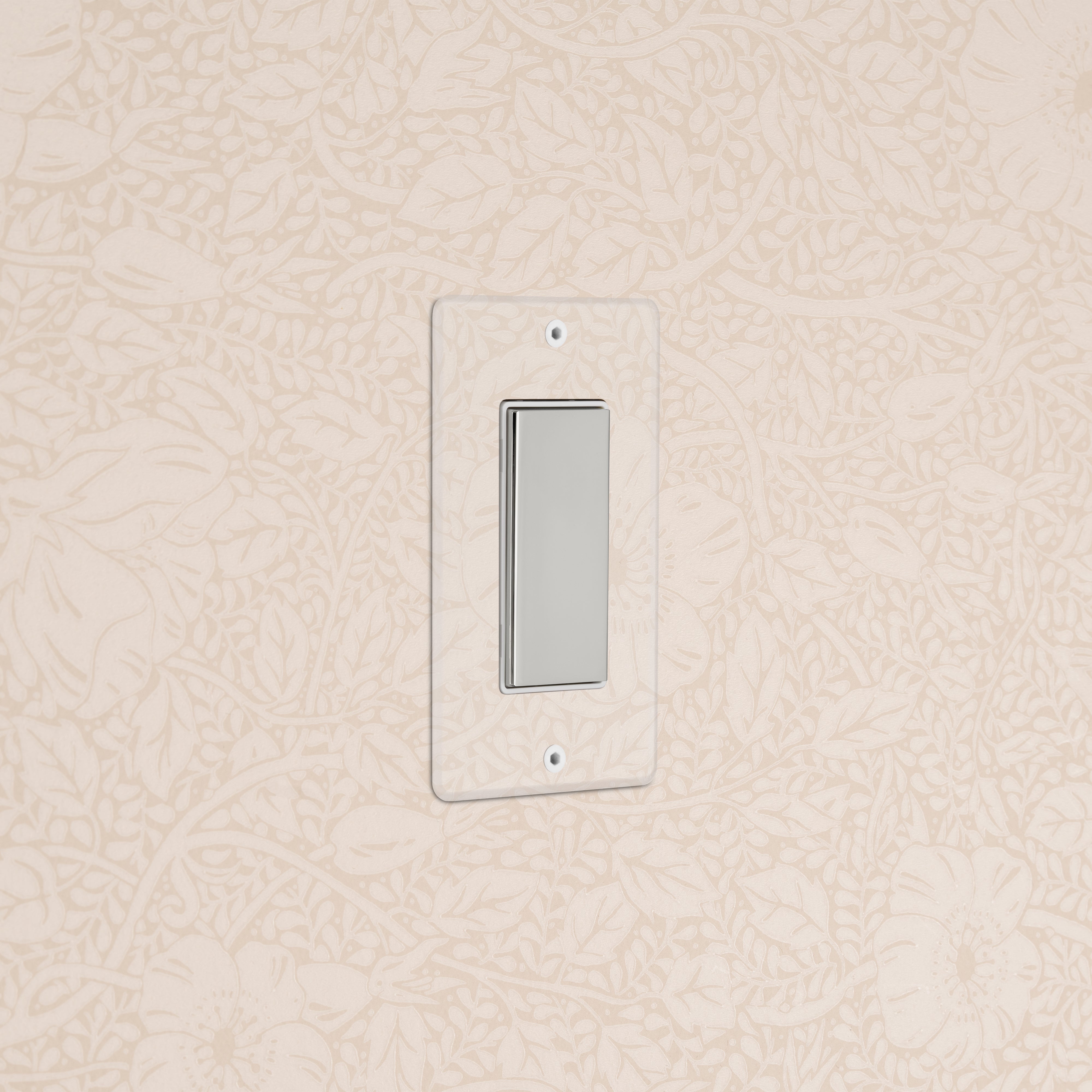 Kew 1G Center Retractive Rocker Switch in clear polished nickel white with a clear rectangular faceplate on wall.