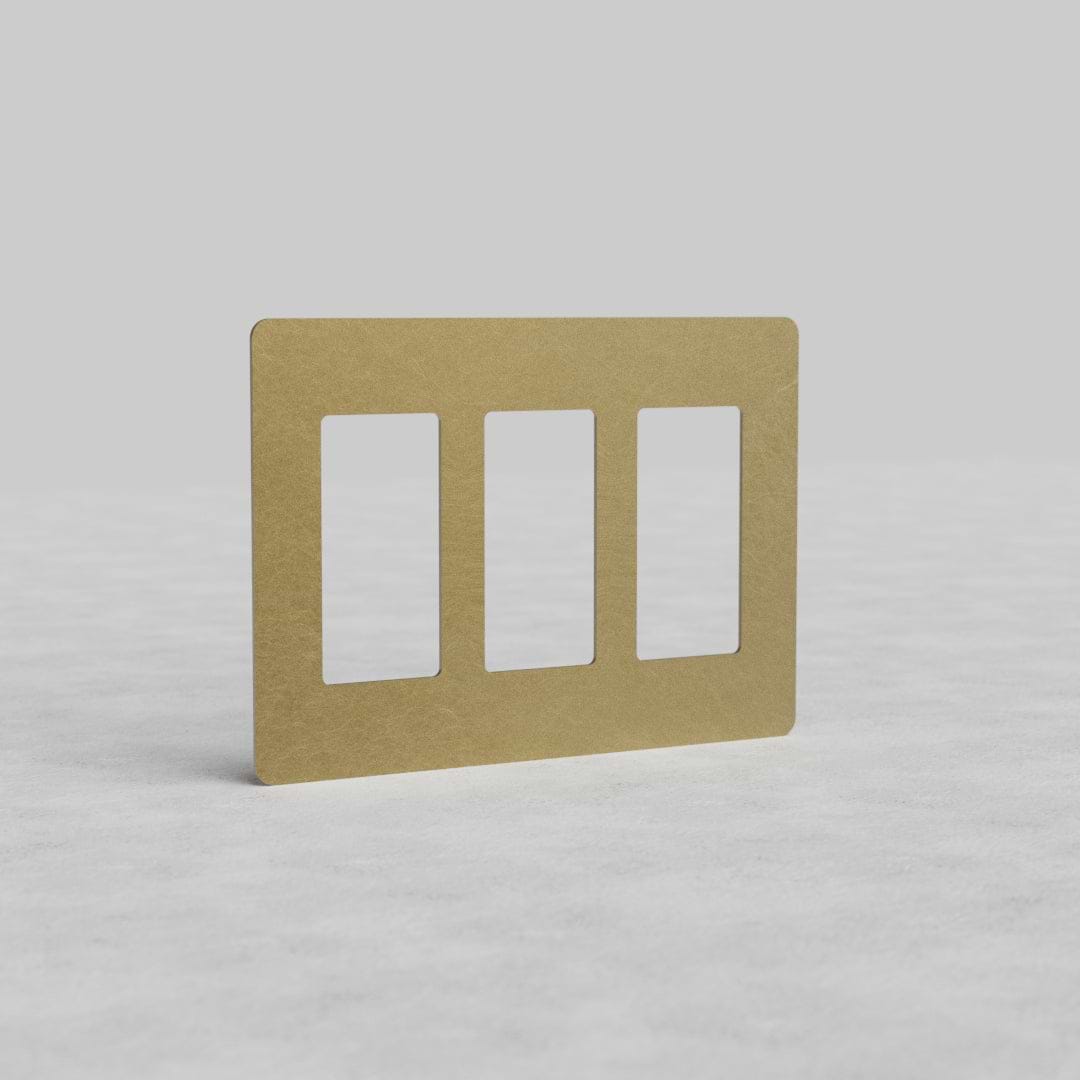 Antique Brass 3G outlet plate Kew US with three vertical outlet slots and gold rectangular frame.