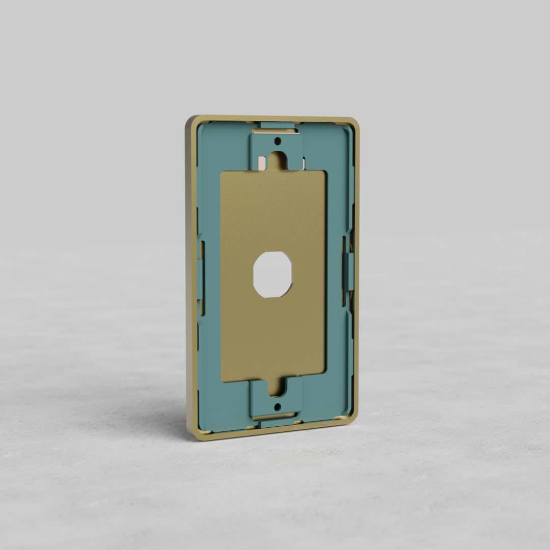 Antique brass 1-gang switch plate, Grove US design, with central cutout, on a light surface.