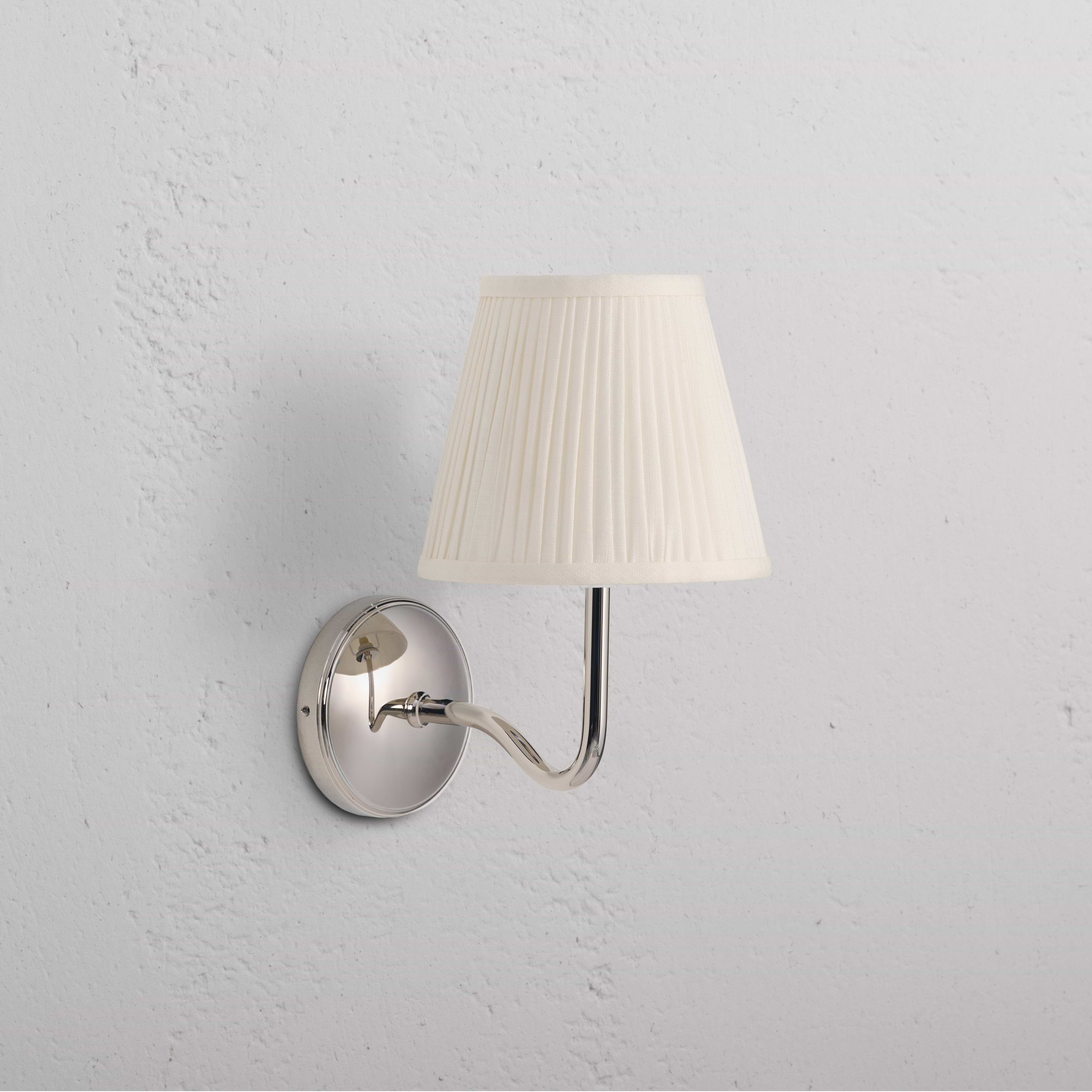 Malvern Medium Wall Light in Alabaster White with polished nickel arm and round backplate, pleated shade.
