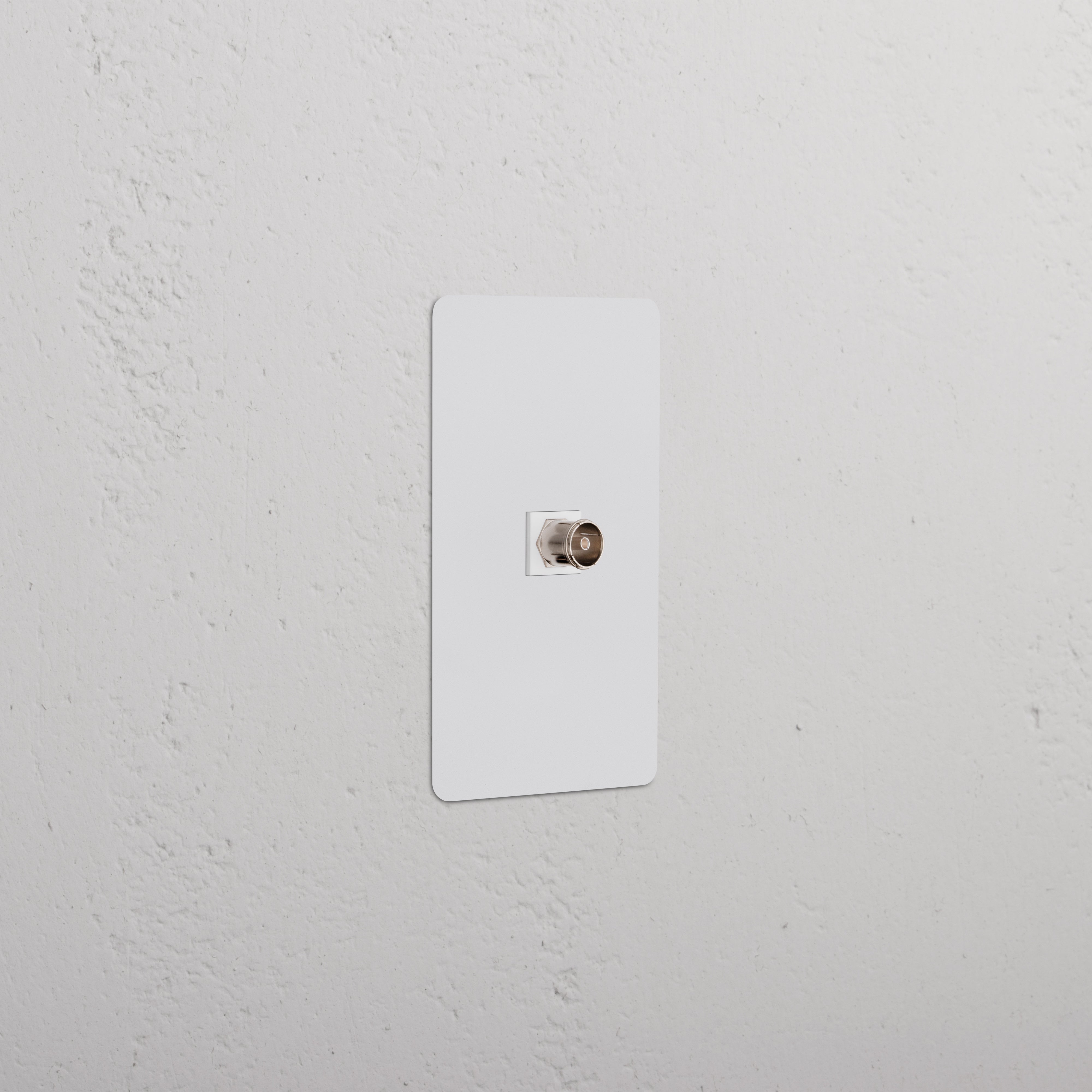 Kew 1G TV Keystone in paintable white, single gang wall plate with central port for TV cable connection.