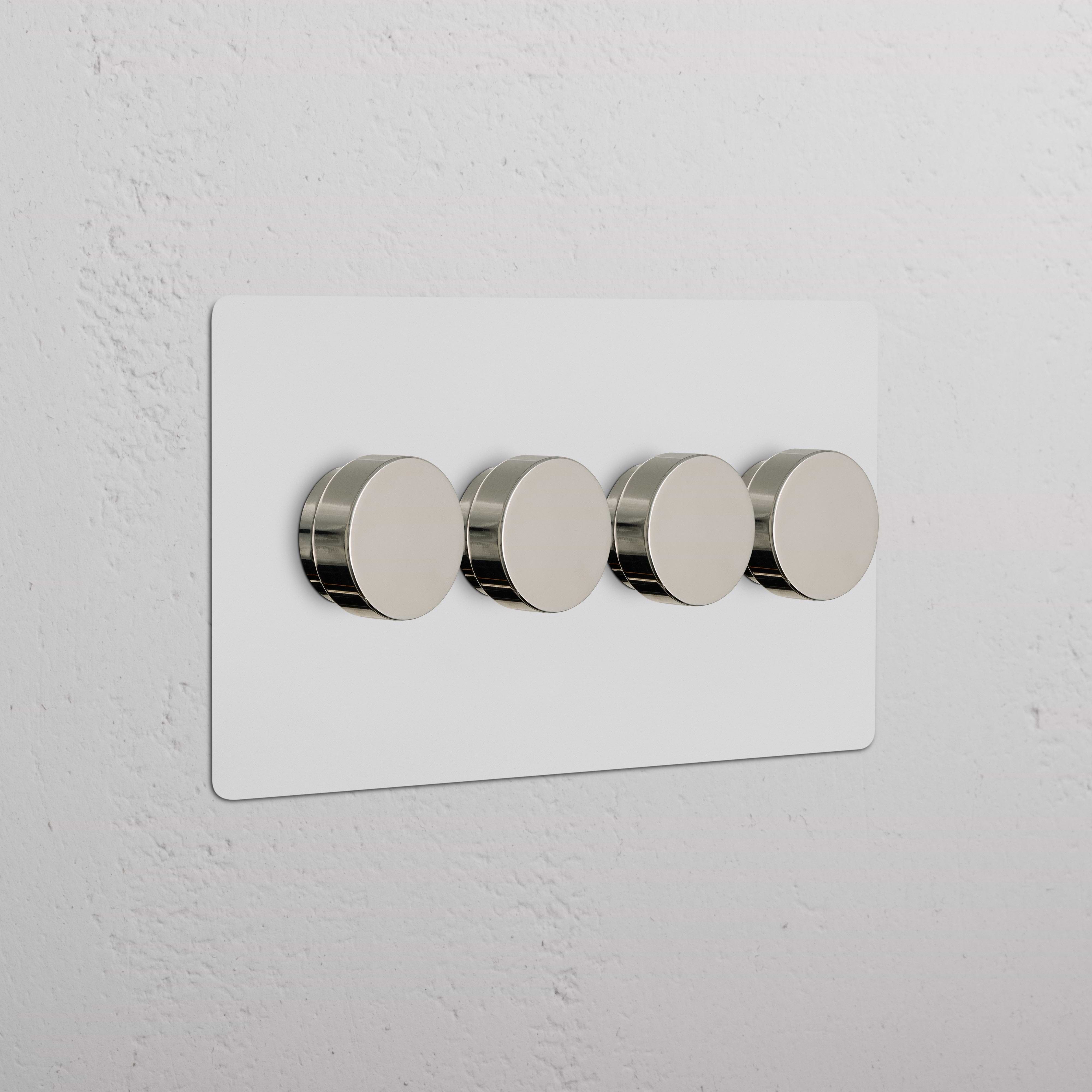 Kew 4G Dimmer Switch with four round knobs, paintable polished nickel finish on a white plate.