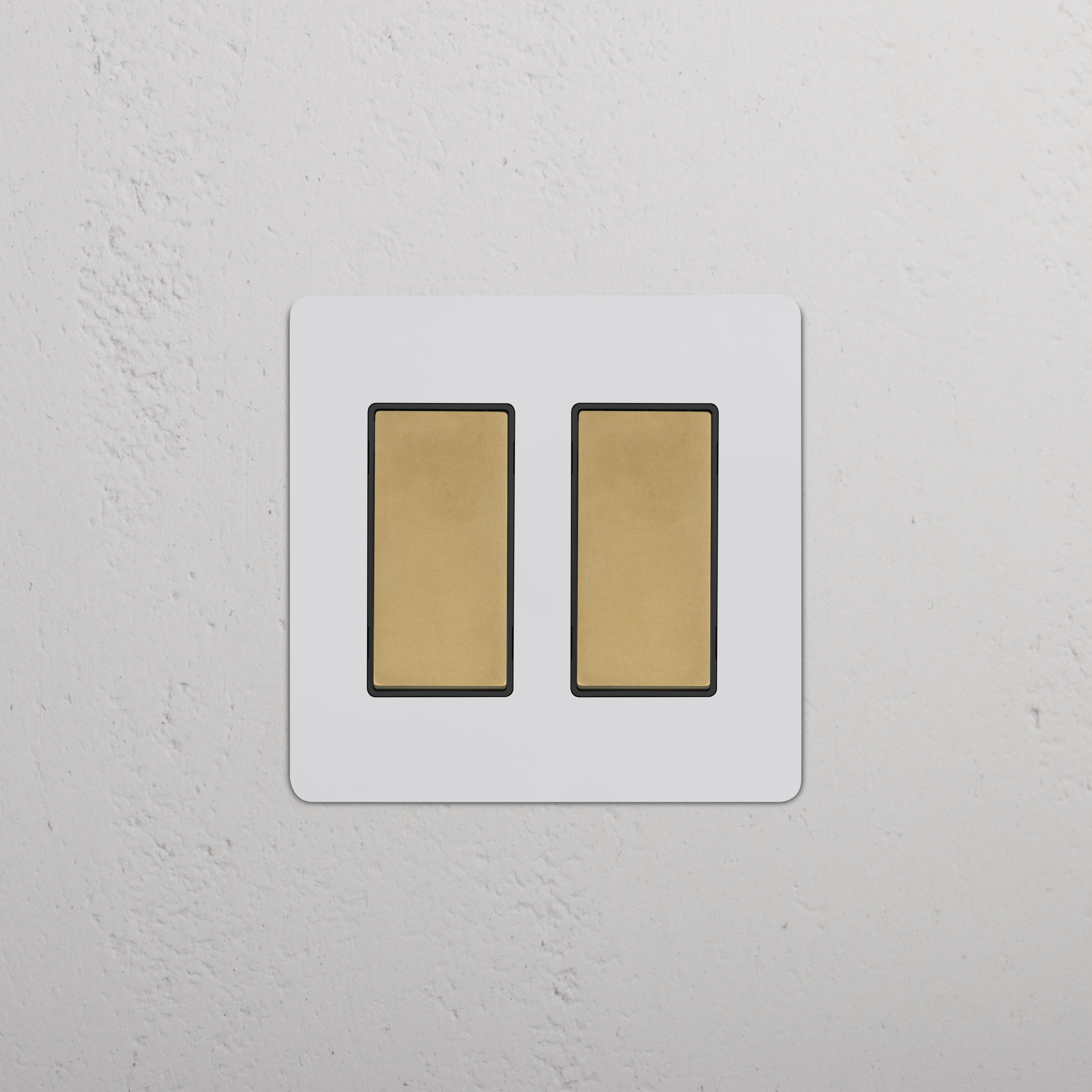 Kew 2G Rocker Switch in paintable antique brass black finish with two black rectangular rocker switches.