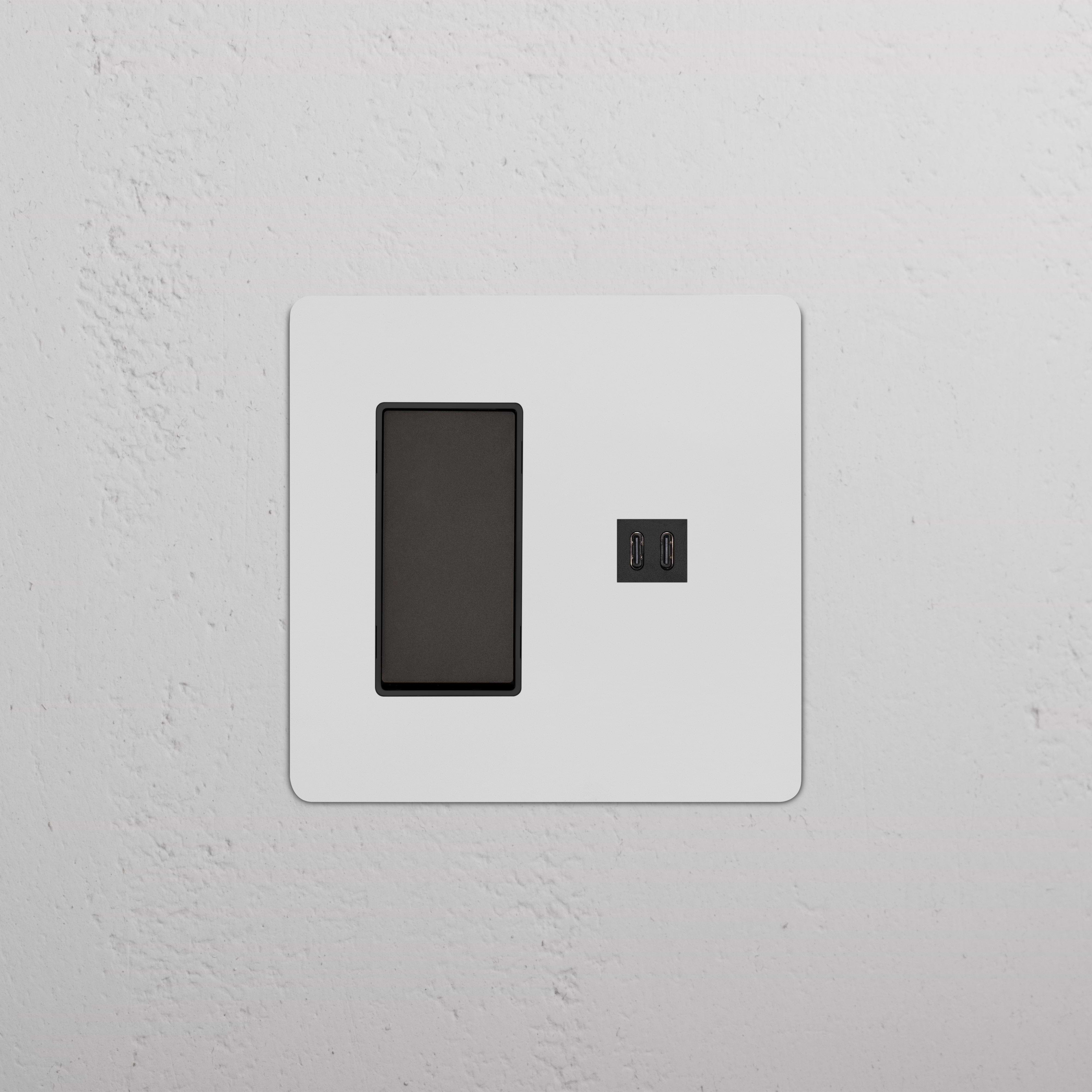 Kew 2G Rocker Switch & Fast Charge USB in Paintable Bronze Black on a wall plate, for electrical control and charging.