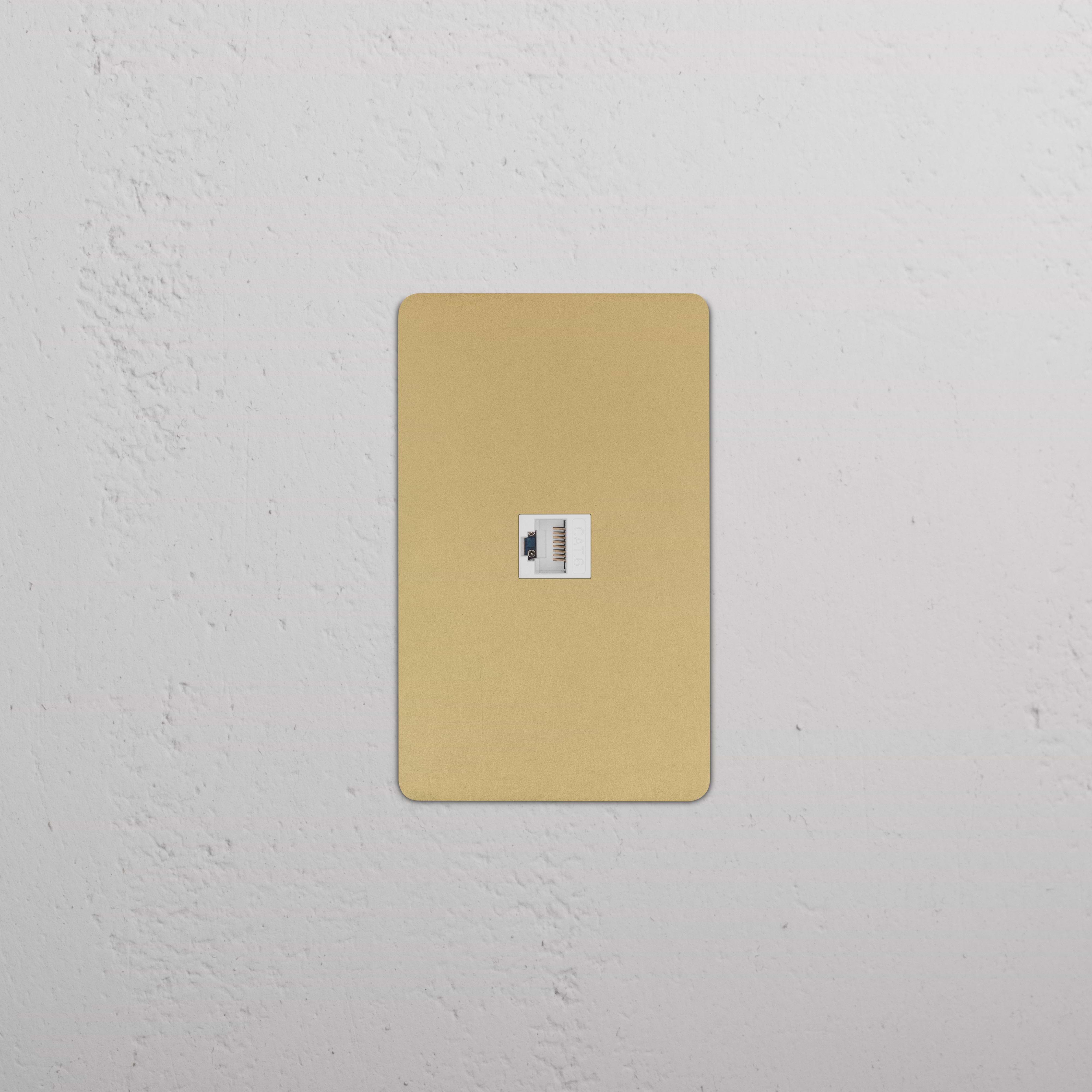 Kew 1G CAT 6 Keystone wall plate in Antique Brass White, featuring a single Ethernet port.