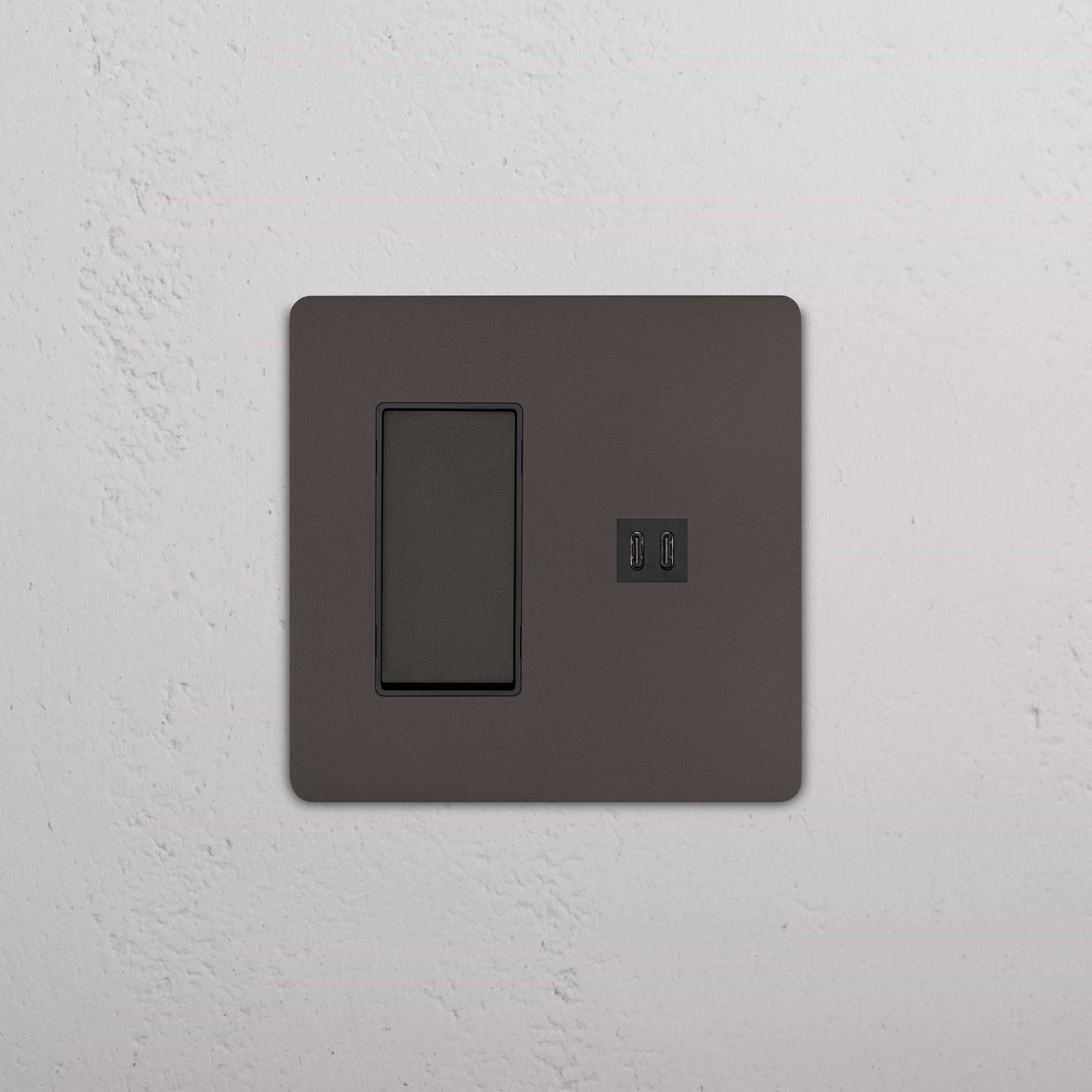 Grove 2G Rocker Switch with Fast Charge USB in Bronze Black, dual rocker and two USB ports on a wall plate.
