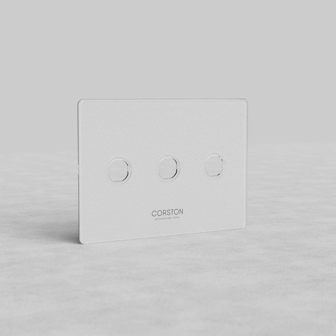 Clear 3G Switch Plate Kew US with three circular switch buttons and CORSTON branding on a flat surface.