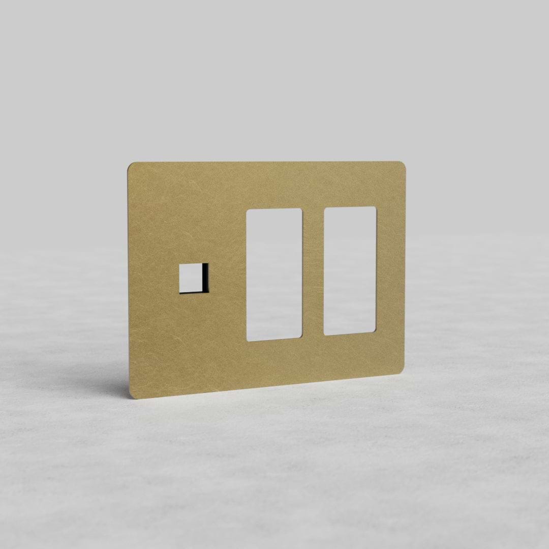 Antique brass 3-gang plate with two outlet cutouts and one keystone port, Kew US style.