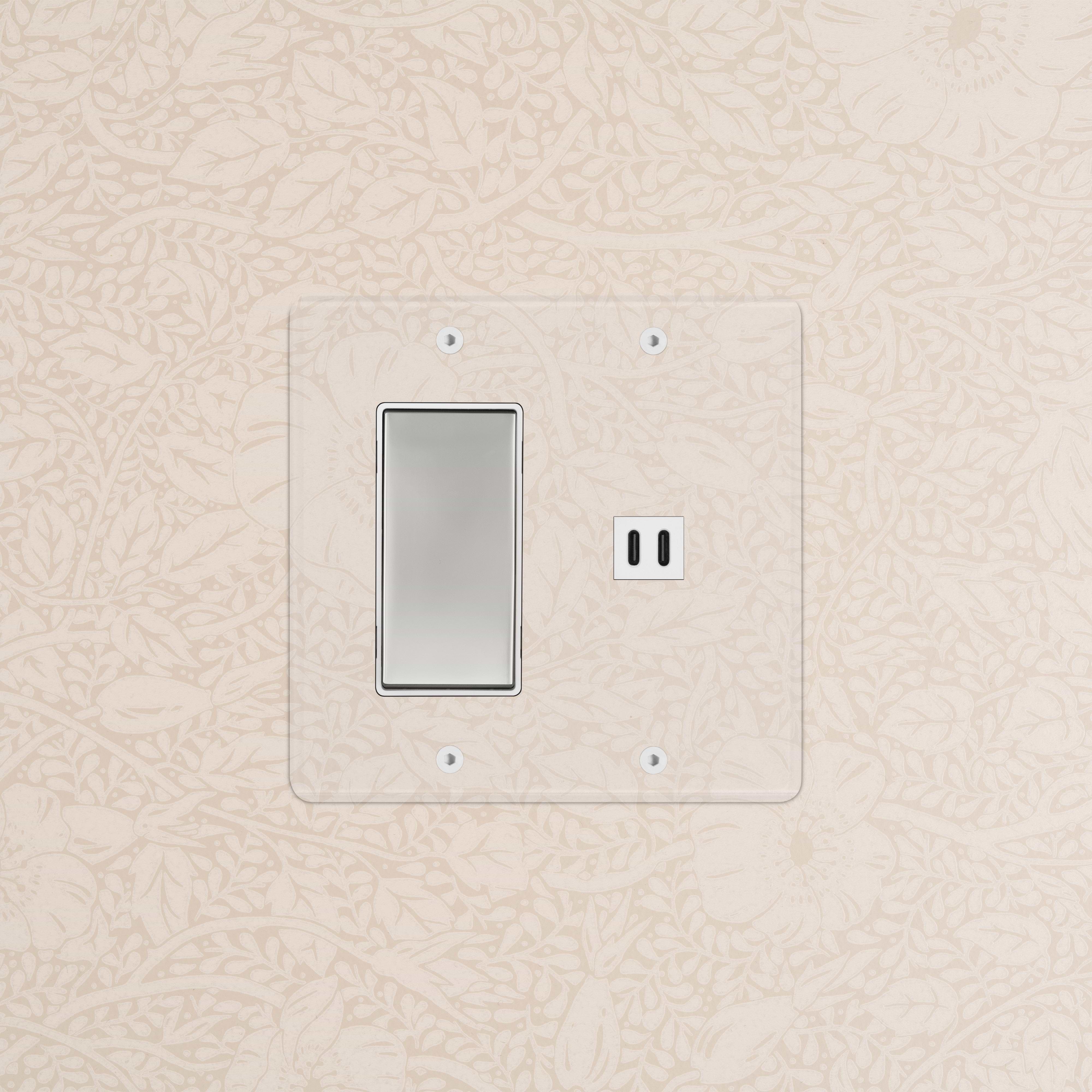 Kew 2G Rocker Switch with Fast Charge USB in clear polished nickel white, mounted on wall.