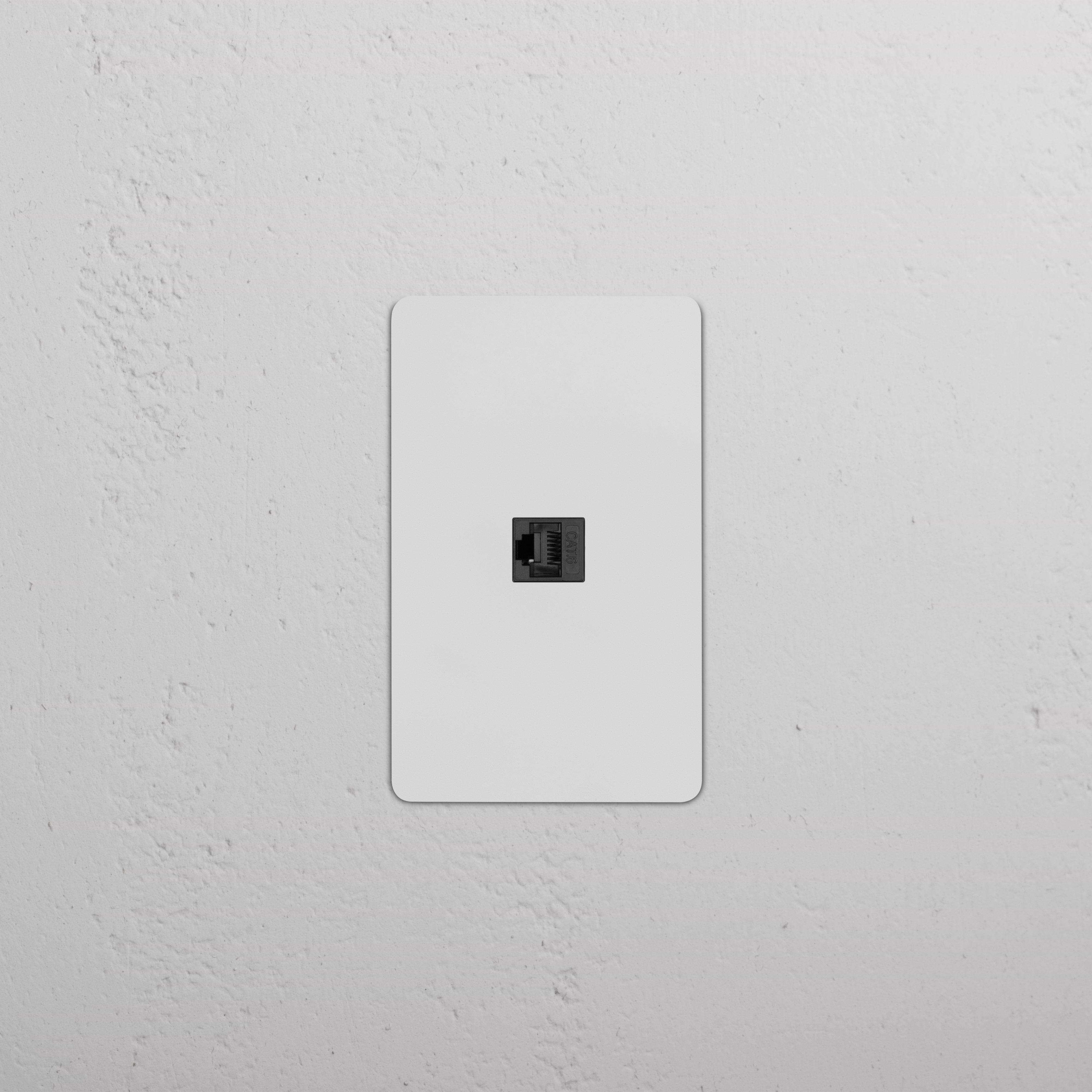 Kew 1G CAT 6 Keystone, paintable black, single Ethernet port module for data networking installations.