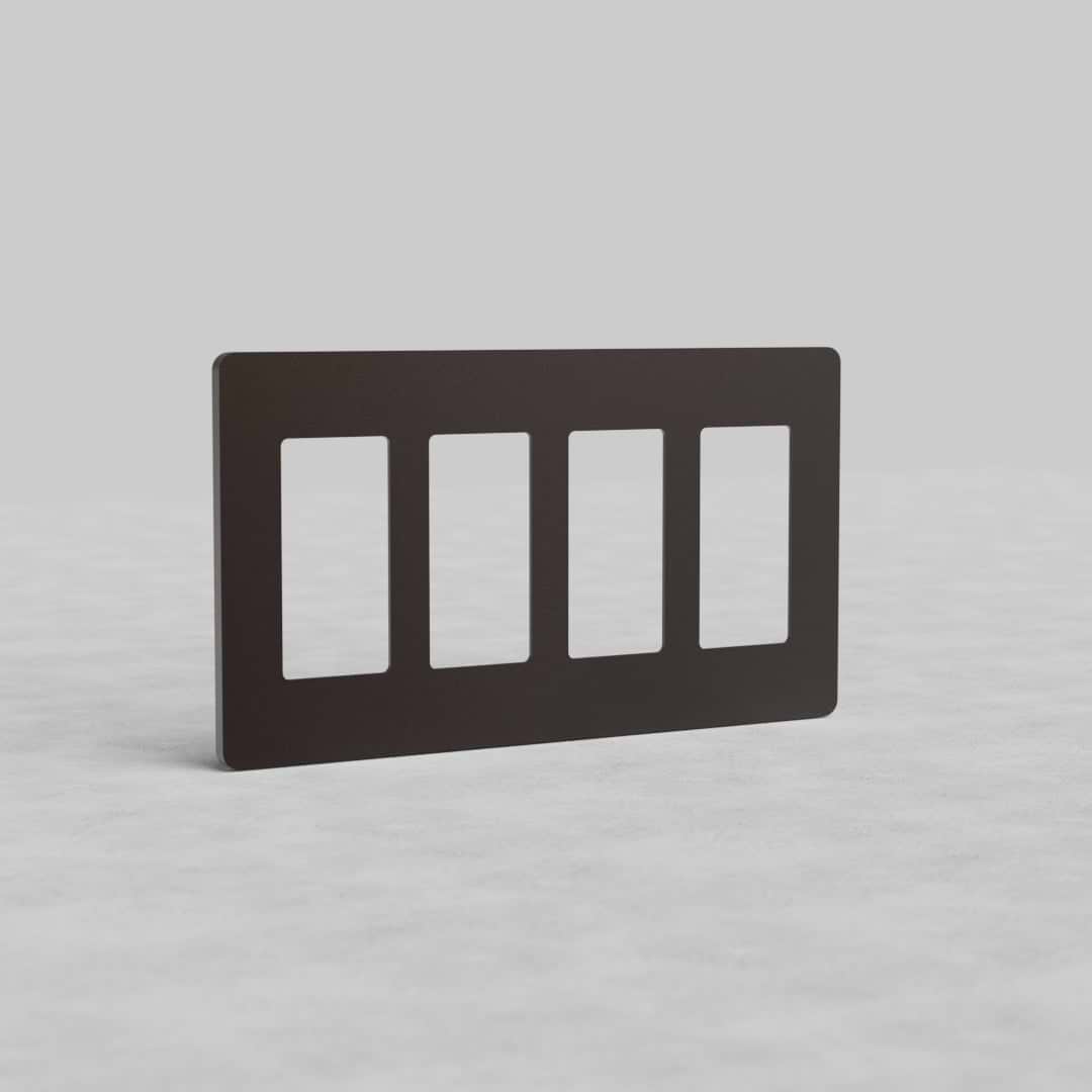 Bronze 4-gang outlet plate, Grove US style, with four vertical rectangular openings, on a light background.